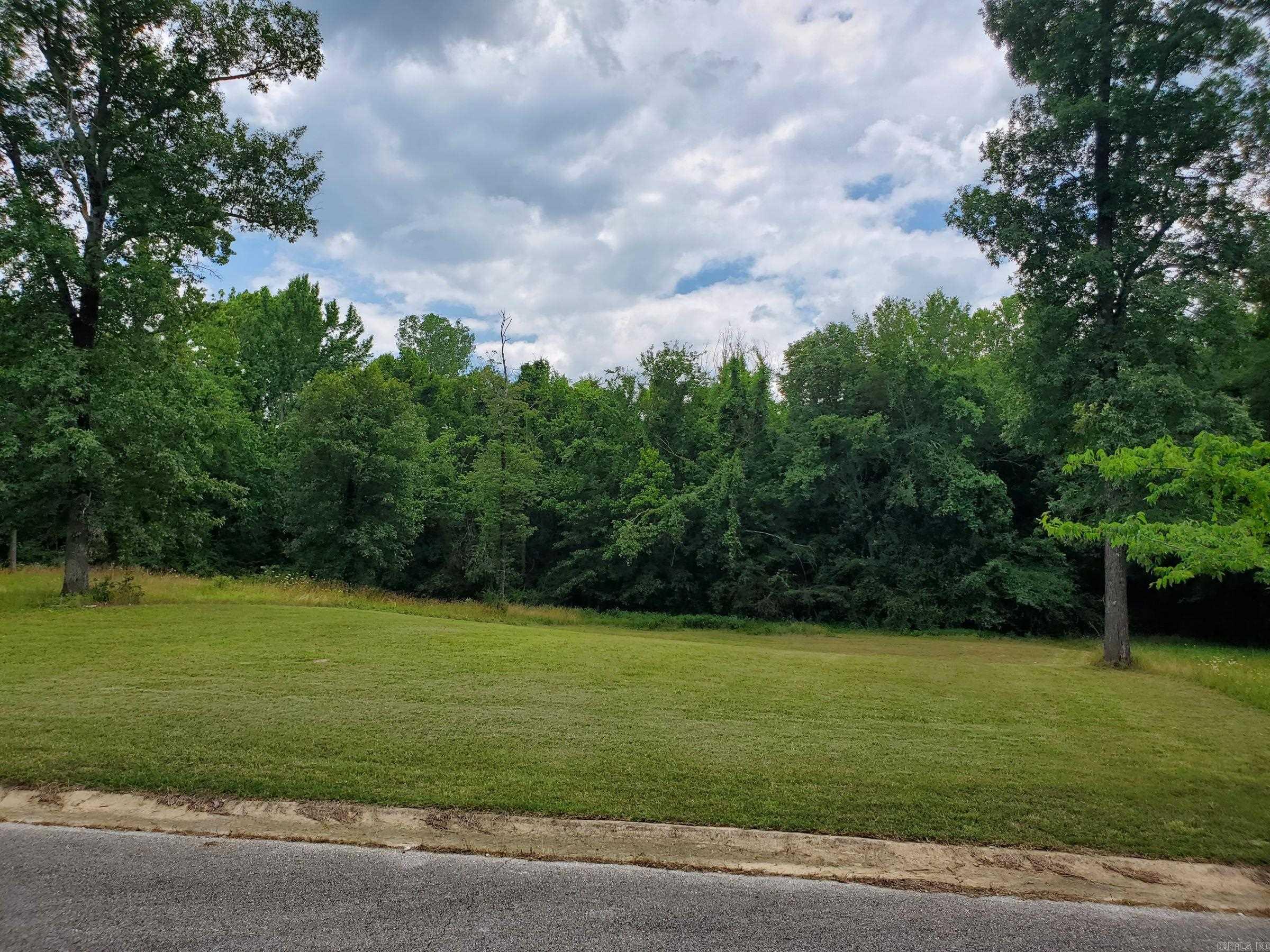 Beautiful building lot sitting right in town yet has a secluded feel. Power and water at the road. Property is zoned R2 so a duplex could be built. Ready to build on.