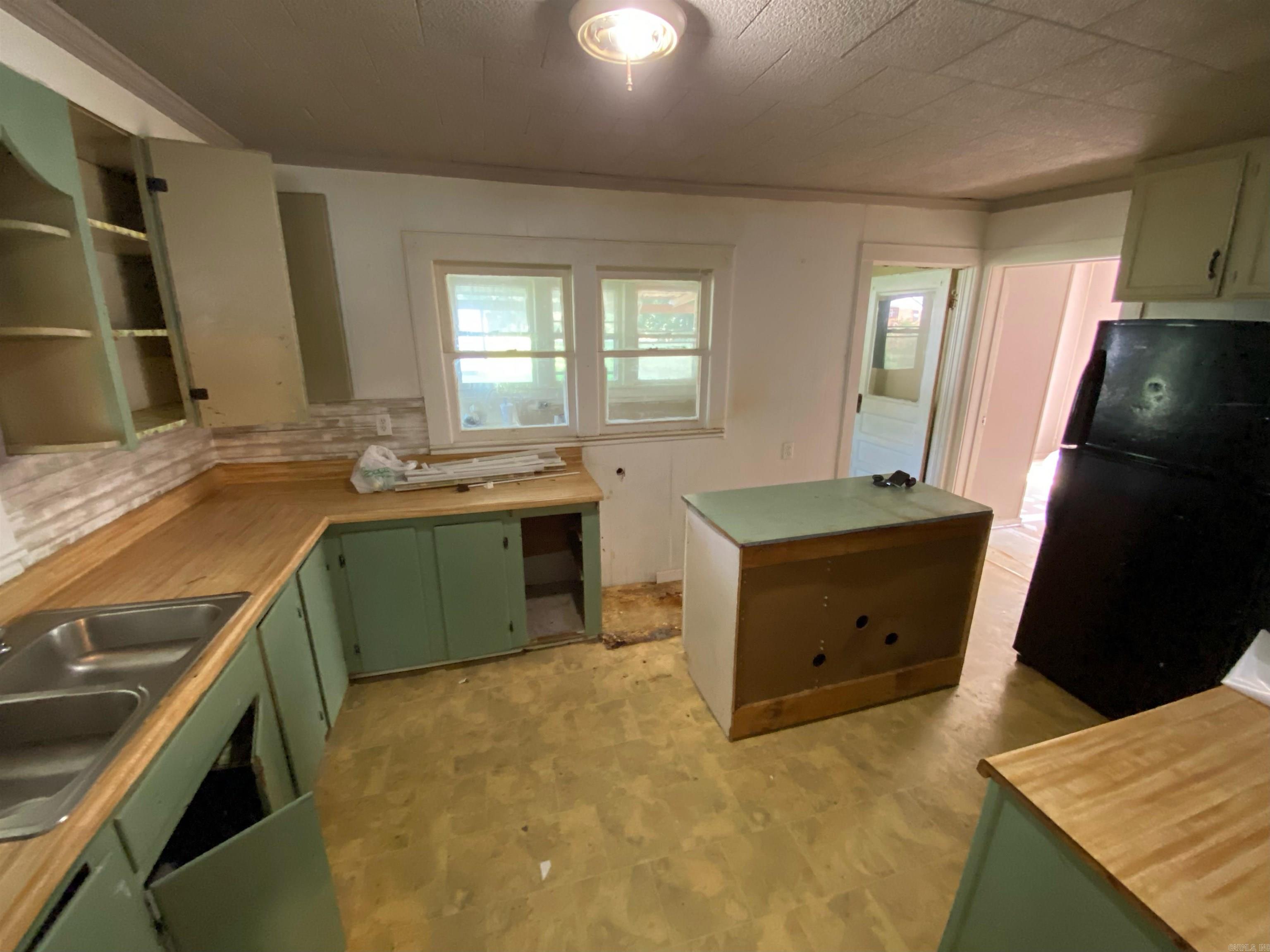 242 E Davis  Piggott, AR