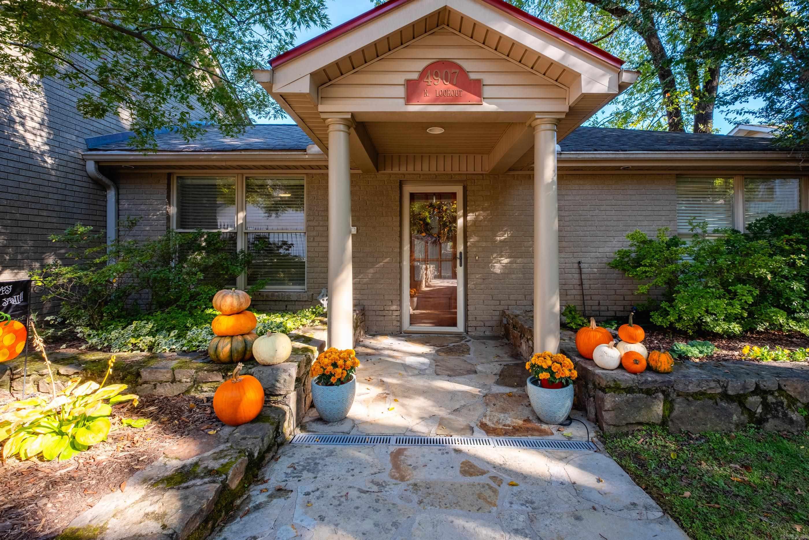 Situated in the highly walkable Hillcrest neighborhood, this stunning home is a short walk to restaurants, cafes, grocery shopping, Allsopp Park, and so much more! Designed for versatility, the floor plan offers 2 spacious living areas. Ideal for a children’s wing, in-law quarters, or multi-generational living. The open-concept layout, perfect for entertaining, boasts a wall of windows that flood the space with natural light and features hardwood floors throughout. The gourmet kitchen impresses with top of the line appliances and abundant storage. Upstairs, the primary suite offers a serene retreat with a sitting area, his-and-hers closets, and a spa-like en-suite bathroom. A bonus loft with custom built-ins and a pool table provides extra space for relaxation or fun. The second living area boasts a wood burning stove and eat-in kitchenette. The professionally landscaped, fenced-in yard with landscape lighting creates an inviting oasis for day or night. A spacious deck overlooks Allsopp Park, while an attached, rear-entry two-car garage and 5 additional parking pads ensure ample guest parking. This one of a kind home blends luxury, comfort, and an unbeatable location! See remarks.