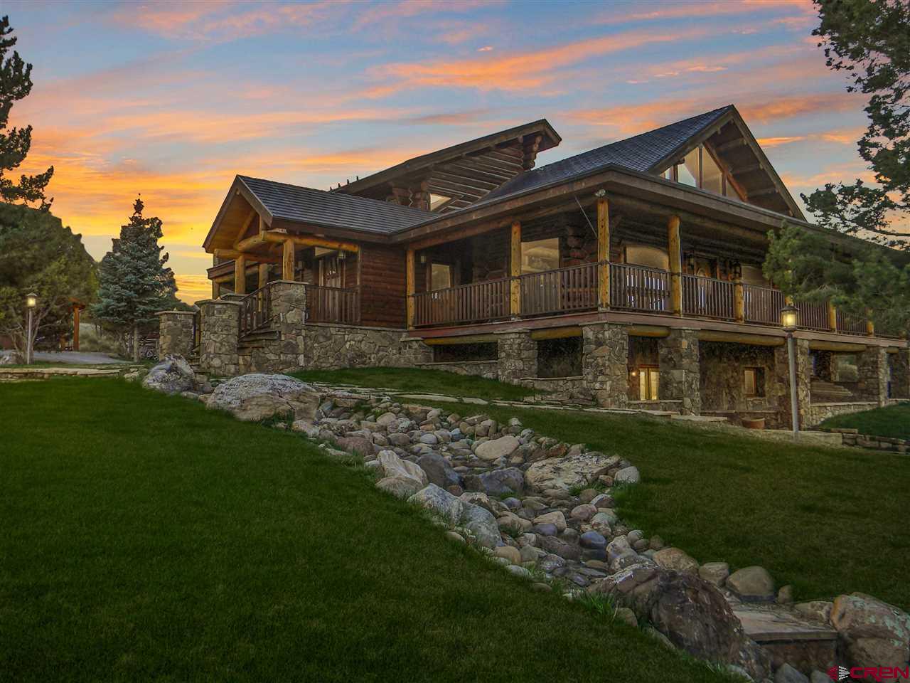 The ultimate Colorado mountain location w/ privacy & mountain views. Welcome home to Country Living on this 8 acre estate of open space and irrigation in beautiful Ridgway, CO. This home features 5 bedrooms, 4 bathrooms, and 8-car garage. This beautiful custom-built log home is fully equipped w/ horse stables and a 1740 sq ft pole barn for hay or equipment storage. Don’t forget to add the 4,495 sqft 8-car garage for the ultimate car enthusiast and the perfect venue for weddings & events! Amenities of the property include: Timbers that are kiln dried Douglas fir from Oregon, T&G blue pine ceilings, copper shingle roof, custom kitchen cabinets that are made of tobacco wood & maple. The living room floor is red/white reclaimed oak from the South. Italian made pizza oven in the kitchen & an underground vault w/ cedar interior lining in the basement of the home. Separate septic system for the barn & house, walk-in freezer & more!