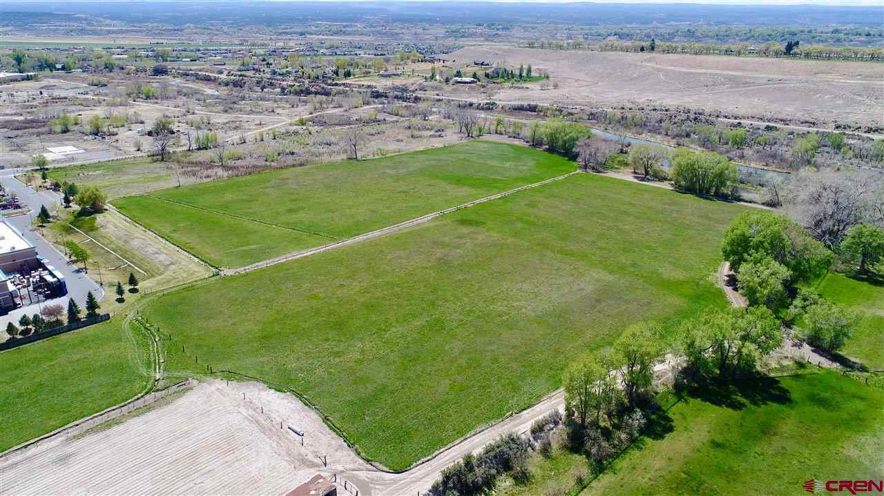 Here it is, one of the last commercial development opportunities in the hub of Montrose! This listing is for Lot 4-D which is 1.90 acres. There are (8) parcels for sale, all listed separately. These prime B-2 zoned parcels are off of the future 100 ft Rio Grande Avenue and the Ogden Road extension, which will play a key factor in giving frontage to these parcels. Take in the Uncompahgre River to the west, the beautiful San Juan Mountain Range to the south, and the new bike paths which will provide both road and foot traffic. Flat, usable parcel with gravel on site which can be crushed and used for roads. This is potentially a huge cost savings. Located near the signaled intersection of South Townsend and Ogden road, this property has excellent exposure and is easy to access. This is a prime location close to City Market South, Walmart Superstore, next to Home Depot, Target, Marshall's, Natural Grocers, Golden Gate Gas Station and the new Montrose Rec Center. One of the last prime development properties close to the river in the City of Montrose.
