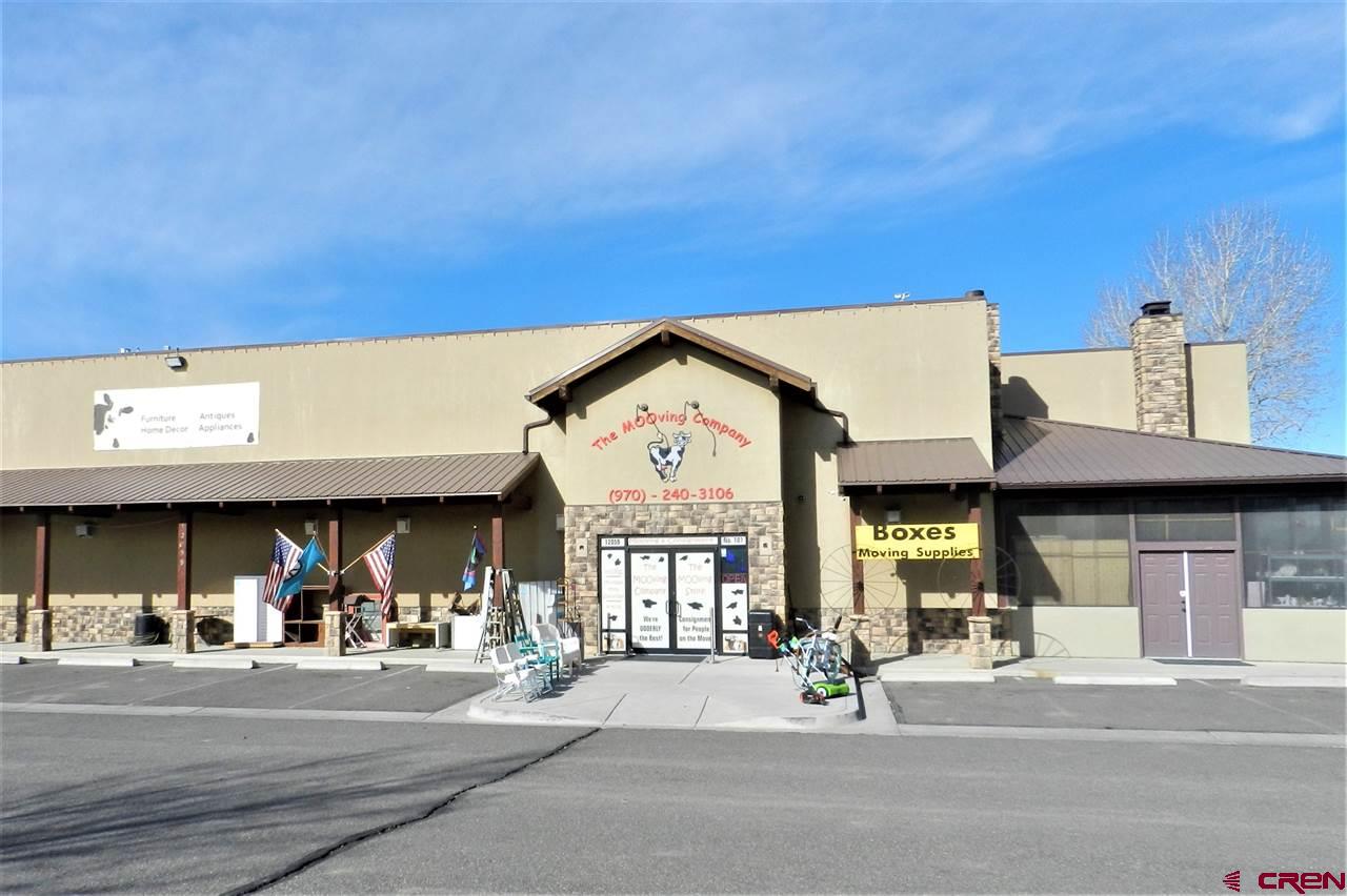 ALPINE PLAZA COMMERCIAL CONDOMINIUM!   Retail/Showroom with Warehouse.    10,038 sq.ft. (MOL) well maintained, attractive stucco building zoned B-3 in the City of Montrose. Building features a large showroom, warehouse with 10’2” x 10’2” overhead door, 3 offices, 3 bathrooms (2 ADA), kitchenette, off-street parking and mature landscaping. Added features are an updated fire suppression system and security system consisting of cameras, alarmed doors and motion detector lights. Located just north of the airport, near DMEA.  Incredible tax break with Opportunity Zone designation!