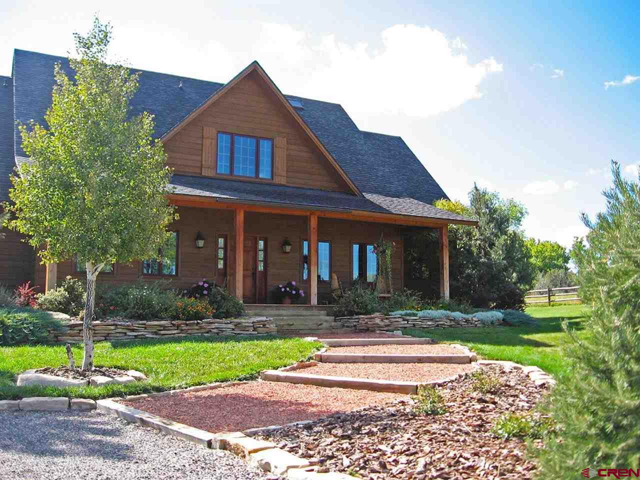 This luxurious 225 acre estate is conveniently located 5.5 miles west of Montrose, Colorado off of Spring Creek Road. This ranch is positioned atop a beautiful mesa overlooking the Montrose Valley to the East and a short distance to the west is the beautiful Shavano Valley. Above the rolling hills and the lush green meadows are spectacular views of the San Juan Mountain to the south. Running along two sides of the property are canals lined with Cottonwood trees that provide ample water for over 100 irrigated acres. The main house is a beautiful 2 story, 3,378 sq.ft., 4 bedroom, 4 bath home with several covered porches and surrounded by flowers, trees and landscaping. Next to the house is a detached garage built by Morton Buildings. The Guest House is a single story, 1,600 sq.ft., 3 bedroom, 2 bath house built in the 1960’s. This is a must see property.