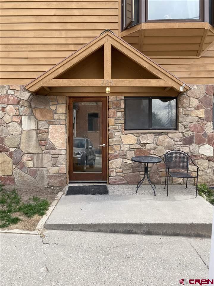 July 1 update - EASY TO SHOW.. short notice okay!  These two units, one zoned commercial and one zoned residential) have been combined into one 1140 square foot unit (currently used as residential) encompassing the entire first floor of the Sixth Avenue condos building just off of main street in the center of historic downtown Ouray. This opportunity offers tons of flexibility to create what works for you. Short term rentals permitted in this location. Currently set up a a 3 bedroom with a large living area, one bathroom and a small kitchenette. Seller has received approval to add a full kitchen and 2nd bathroom.