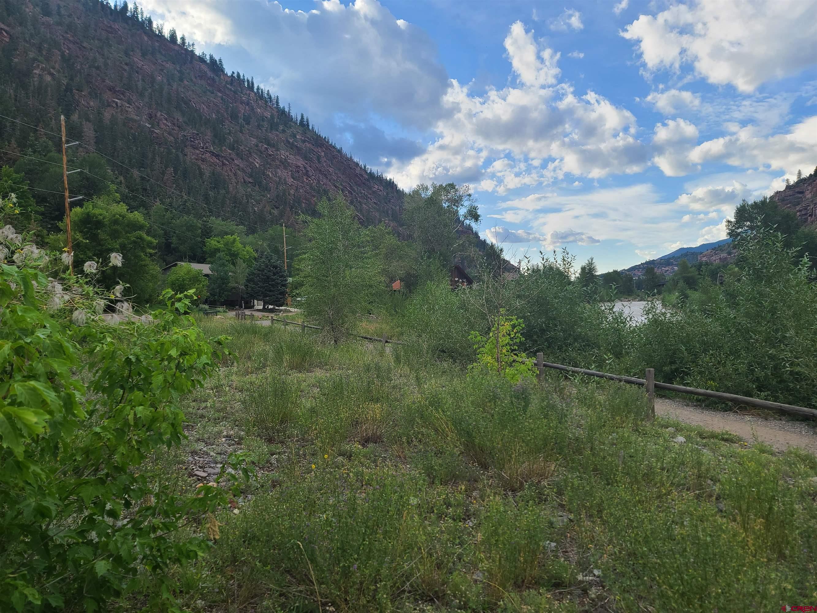 Wonderful lot along the Uncompahgre River and North Ouray Corridor trail. All utilities at the property line. Flat and totally usable. Great views of the river and surrounding mountains and mining structures. Zoned R2 which allows for single family or multi family structures. Additional lots are available. These are the only riverfront lots in Ouray. Property is part way through the subdivision process.