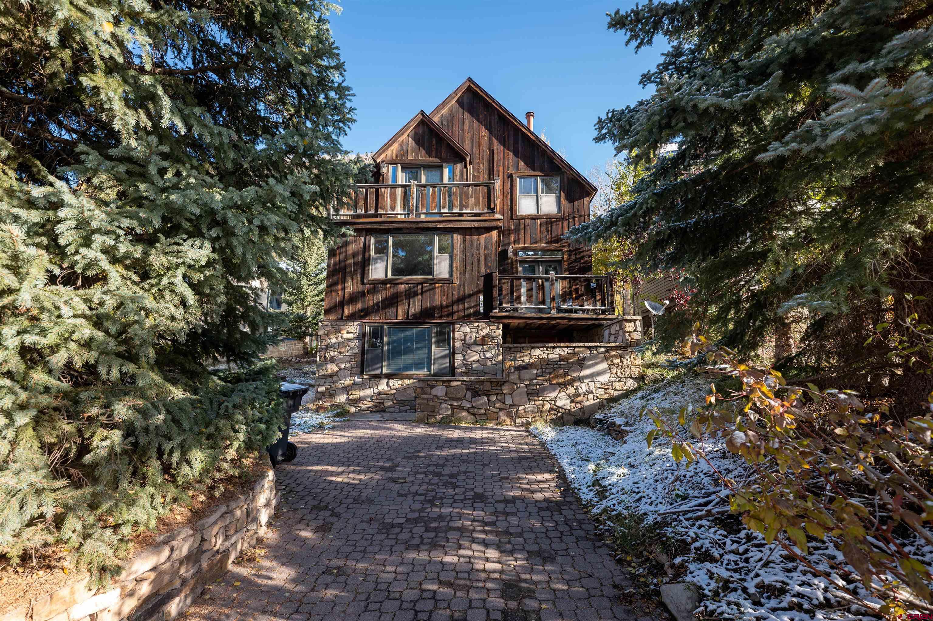 Sunshine and views in the heart of the historic core of Telluride. One of top builder Corey Fortenberry's first homes, built in 1986. Super well located on Galena Ave., between Aspen & Townsend Streets, a couple of blocks from Colorado Ave., the commercial district, ski lifts and Gondola. Three bedrooms, 2.5 baths within 2756 square feet. The 33' lot width provides for a comfortable interior layout, and the common private open space allows for a pleasant backyard. Transfer of Deed no sooner than January 17, 2022.   Listing & Location Info