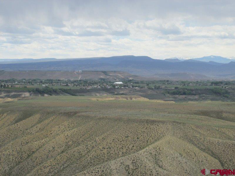 Wide open space on this 56+ acres, bordering BLM on 3 sides. The majority of the acreage is on top of a bluff with endless views.  Build a home or use this property for recreation. Mobile or modular allowed. Well permit needed and septic required. No irrigation water and non-irrigatable.  Buyer needs to verify possibility of further development for Lot 3.