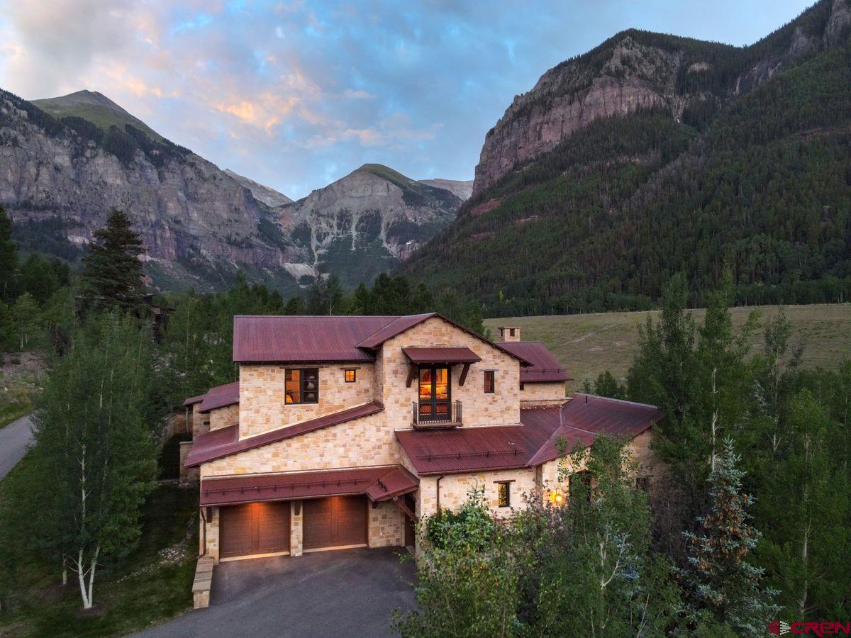 This stunning estate is located in the highly desirable Idarado Legacy neighborhood. It is perhaps the most beautiful of all mountain settings, just a short walk from downtown Telluride. The home's exquisite Spanish Colonial Revival architecture was developed by award winning Ryan Street Architects. The elegant hacienda's interior was designed by Rachel Mast Design and built by Telluride's deLuca Construction with the most meticulous attention to detail. The seven private bedrooms, large common areas, decks and patios were thoughtfully created to accommodate festive gatherings, while showcasing sweeping views of Telluride's majestic mountains. With over 8,700 square feet, this beautiful home is available to host almost any occasion.