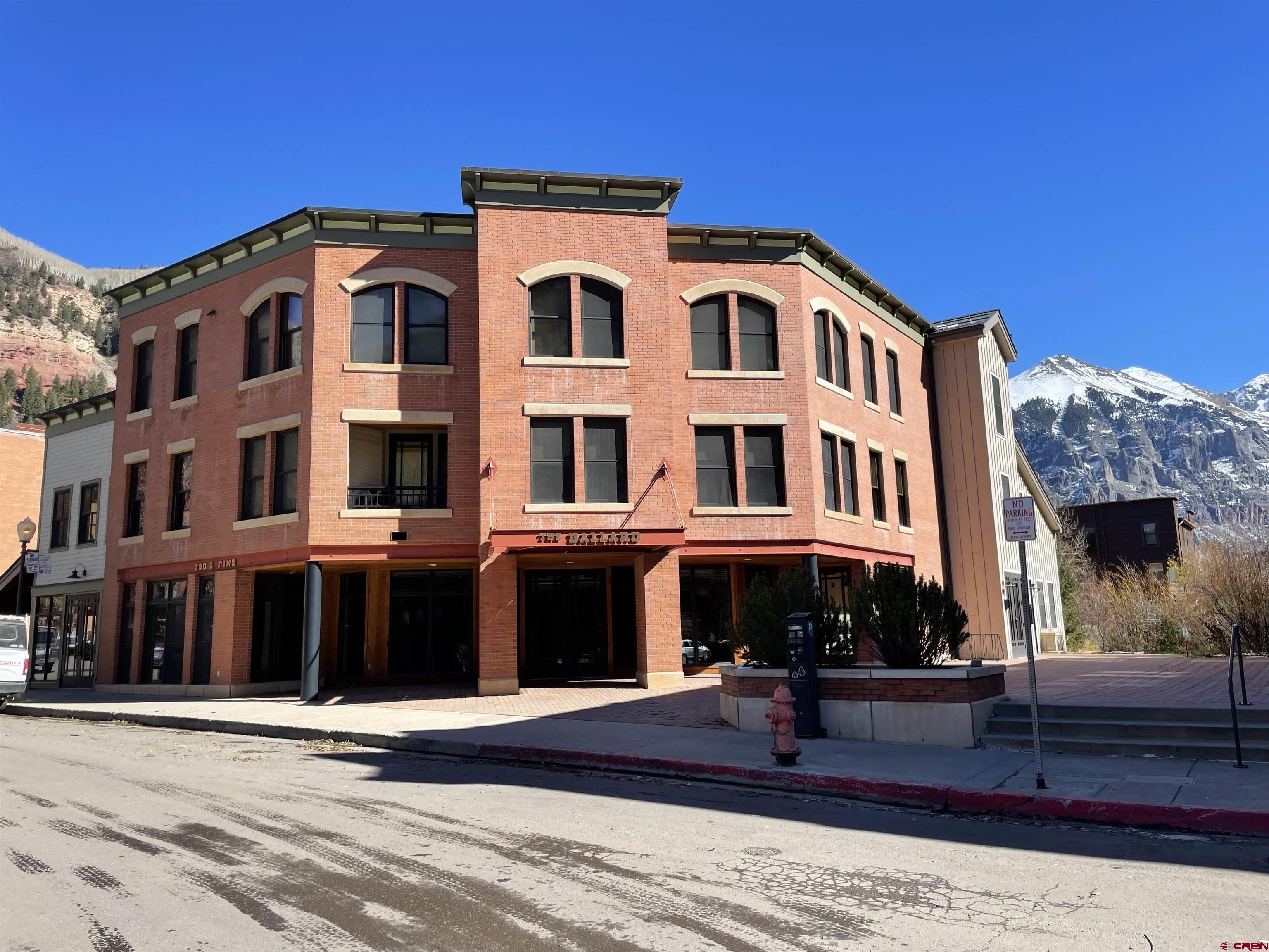 Rare opportunity to own prominent commercial space in Telluride. This space is near Main street with great street level windows that are visible to Gondola foot traffic, diners, and shoppers. Very centrally located two blocks from Gondola and Main St. and is near River and Bear Creek Trails. This property has 2 office spaces that share a bathroom. Current month to month lease in one space, and the other space is unoccupied with versatile possible uses. There is a southern plaza and 3 parking spaces, 2 assigned in garage and one exterior space allocated to the commercial unit. Call/text Broker. Please do not disturb tenants.