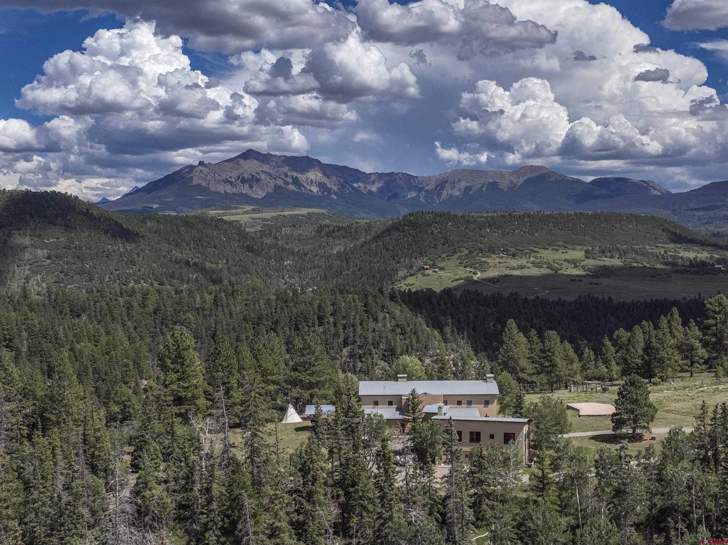 * Please note there is no HOA and this home is Short Term Rental friendly. Perched in a beautiful meadow overlooking the incredible San Juan mountains, this contemporary Lipkin-Warner sanctuary basques in the Colorado sunshine in complete privacy. The light filled home features a 5 bedroom main house and a 2 bedroom guest house / caretakers quarters on 38 rolling acres. With 7,617 square feet, 2 master bedrooms, and a 3 car garage this property has everything you need for your family compound. Located just 30 minutes to Telluride and perfectly situated to all this area has to offer.