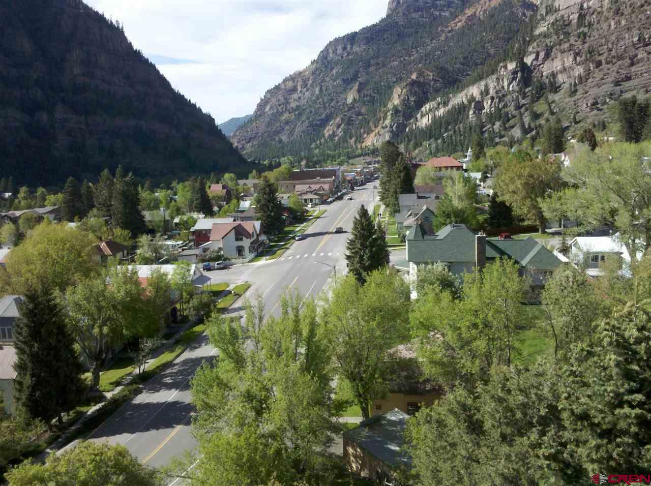 Build your dream home in the Colorado Mountains in Ouray! Phenomenal views over town down main street and up to the Amphitheater, Twin Peaks, and the surroundings. Lot is ready to go with all utilities. High speed fiber being installed in town. Make a change to a better lifestyle in a peaceful mountain town.
