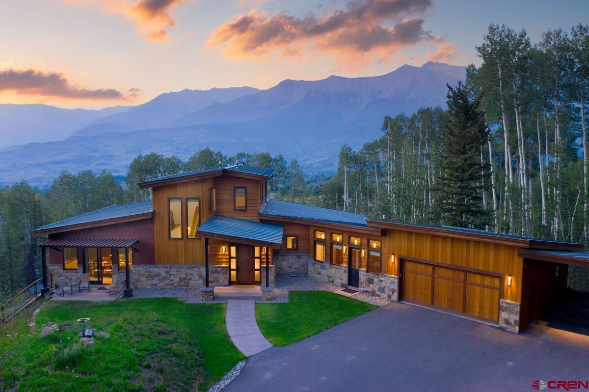 An unprecedented offering, 521 Wapiti is a beautiful custom home with breathtaking views on a private lot in Telluride's coveted Ski Ranches neighborhood. This spacious 5 bedroom home enjoys contemporary finishes and all of the highest-end fixtures and appliances. Soak in views of Campbell Peak, the San Miguel Valley and dramatic sunsets from every room in the home in addition to incredible landscaped outdoor spaces. A large lawn and oversized garage aptly accommodate the best of the mountain lifestyle. Closer to downtown Telluride (and even the Mountain Village Core) than Raspberry Patch, Elk Run, the Preserve, or many of the homes in Mountain Village, this home represents the tremendous quality of new-construction modern homes in a private but convenient location.