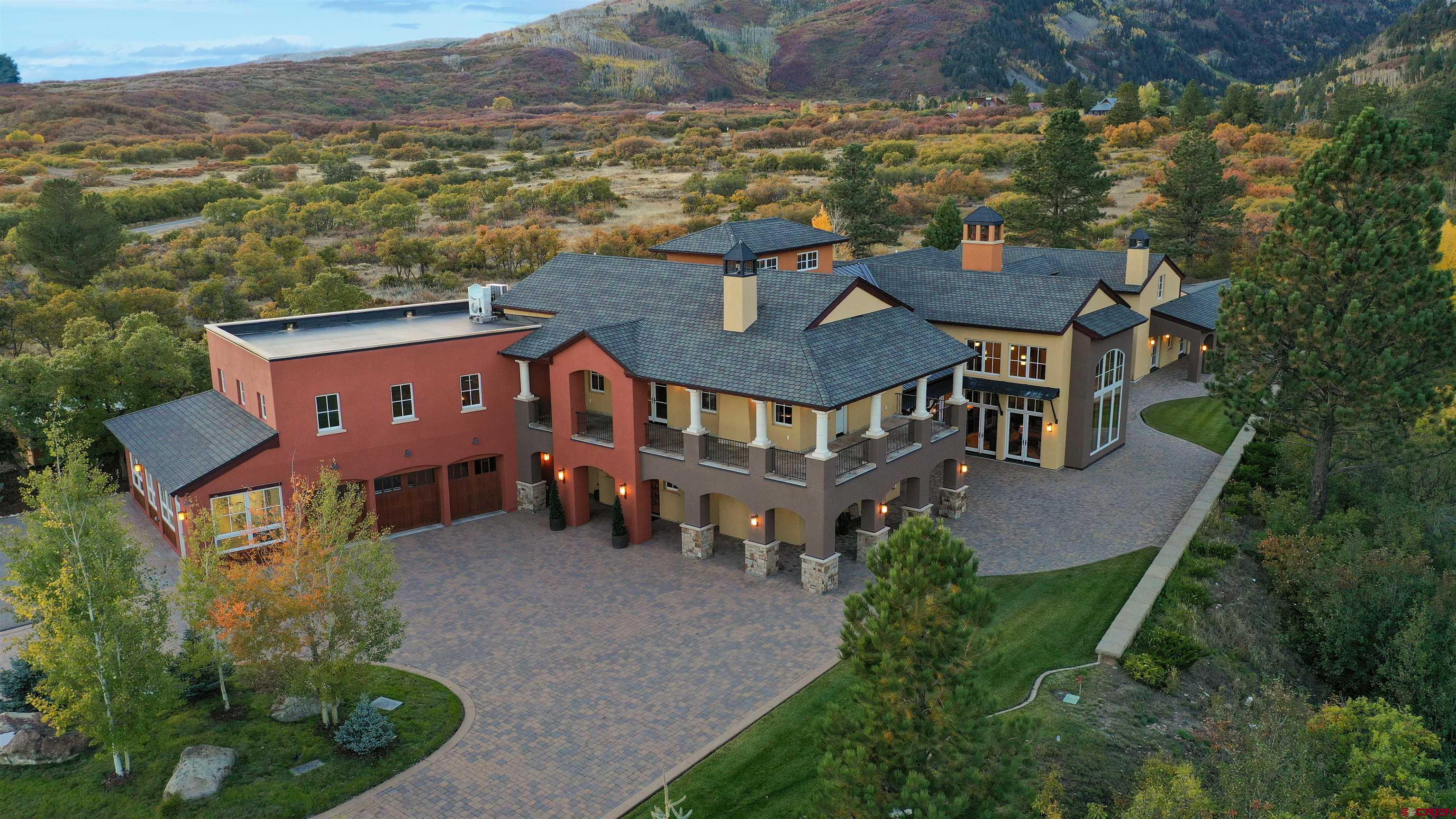 "OPULENCE IN THE MOUNTAINS!" Describes this 175-acre estate that borders three sides of 1.85 million acres of the SanJuan National Forest. The property is split by the La Plata River that is serviced by a magnificent bridge that connects the property. Combining the 175 acres property with the bordering National Forest makes the estate feel much larger than its deeded acreage--that includes five Colorado mountain peaks. THE INTERIOR is designed for comfort with World ClassFinishes and Quality Workmanship in every aspect of this Custom Built Mountain Modern, Four Story, 18,000 square footMain House with opulent furnishings and Three Floor Elevator that is finished in Pecan Wood. There are multiple attached patios and balconies encompassing the perimeter of the house. The area off of the Great Room and Master En-Suite has aFireplace with covered seating.  THE MAIN/SECOND FLOOR features: There is an open concept three room area - first a massive Great Room with a castle designed Fireplace and 22ft Aspen Wood Ceilings that is the focal point of the majestic mountains with views through panoramic floor to ceiling windows. Next a Formal Dining Room to host family holiday meals and stately dinners that opens to a dine-in Chef's Kitchen with Butler's Pantry with unlimited storage. All with GraniteCountertops, Custom Cabinets, Kitchen area with Viking Oven, Gas Range, Oven Warmers and Sub-Zero refrigerated drawers. The two-story Master En-Suite includes a Fireplace, Walk-In Custom dual Closets, Master Bath, Foyer and aSecond Story Bonus Room with magnificent views. Adjacent to the Master Bedroom is a Fitness Center that includes a LapResistant Pool and Private Bath. Just off the Entrance there is an Execute Office with fire-proof filing cabinets. Across from the Office is a cozy Library with Fireplace and floor to ceiling Pecan Book Shelves that is a perfect venue for relaxing with a book or for Executive Meetings. There is a Three Car Heated Garage with an attached 800 square foot Greenhouse, Mud-Room Entry to the house with lockers and a half bath.The Driveway is constructed with heated pave stones.  THE BOTTOM/FIRST FLOOR features: A comfortable, professionally decorated area that feels like a luxurious Antique Opera House with12 seat Home Theater that is powered by Apple TV, separate Snack Bar with sink and refrigerator entrance area. Also sound proof Music Production Room. This floor includes a Half Bath and large Storage Room on this level.  THE UPPER LEVEL/THIRD and FOURTH FLOORS features: A huge Game Room with a Wet Bar, Three Guest Bedrooms (one used asChildren/Teen Bunk Room area) with their own private Bathrooms. You climb the open stairwell to the top/fourth floor ZenRoom that has the most beautiful views of the Estate and surrounding Mountains!  SEPARATE STRUCTURES INCLUDE: *CARETAKER HOUSE: This is a 2550 square foot, Three Bedroom, Two Bath, Two Car Garage. *FOUR STALL BARN:This is a 4356 square foot Barn with Washing Basin. *POLE BARN WITH A UTILITY ROOM AND COVERED OUTDOOR HORSE ROUND PEN: This is a 3650 square foot area.  *OUTDOOR PAVILION: This area includes a full service Kitchen with an Imperial Range Oven with Stove Top, a Serving Area with a Fire Pit in the center of the Pavilion. Also, His and HerFour Stall Restroom/Bath House with a Two Car Garage and RV Pad with Hookups.  *SPECIAL NOTE: This Property includes one of the largest Solar Panel Projects for Utilities in the history of Colorado for SF residence with utility bills averaging $66.00 a month! Power is backed up by an 85 Kilowatt Propane Generator. There is room for expansion with utility hookups to create more potential trophy home sites. This Property is located in an incredible setting for a multitude of activities – camping, fishing, hunting, horseback riding, hiking, ranching, snowmobiling, snowshoeing, cross country skiing, entertaining or just relaxing.  Only 15 Minutes to shopping, dining and nightlife. 30 minutes to Jet Service