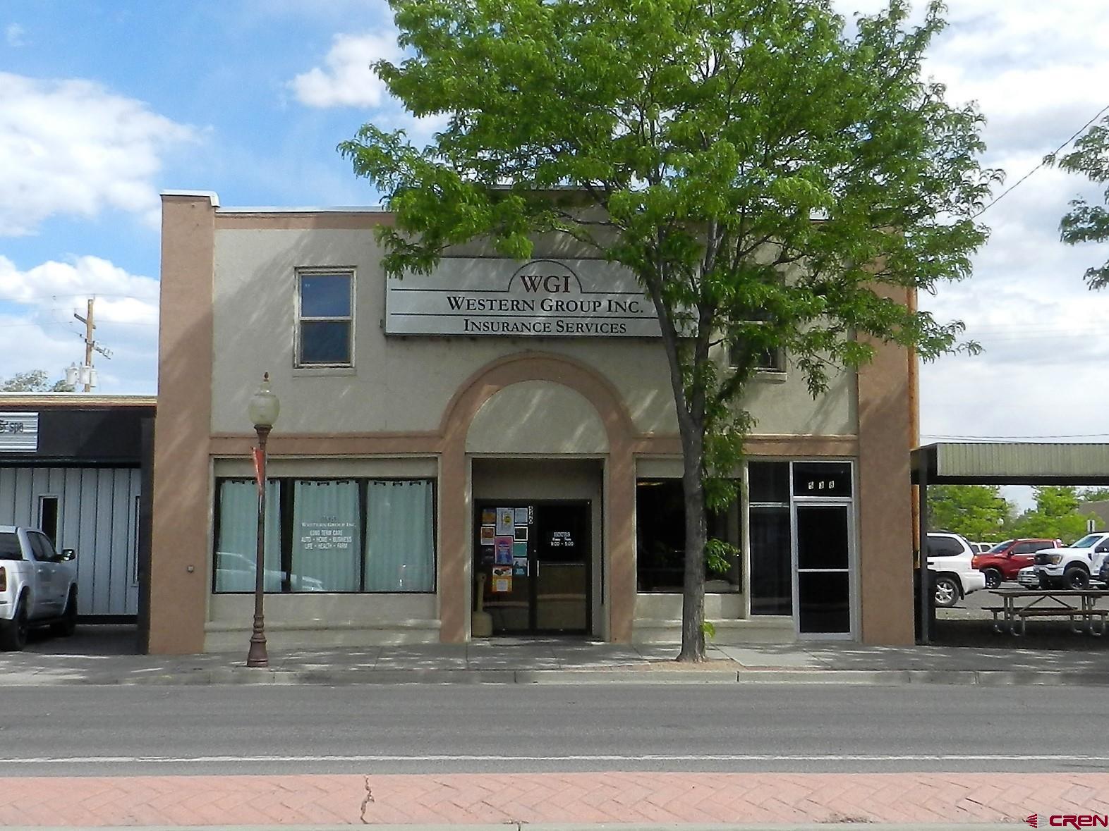 Outstanding Retail/Office Building with Ideal Location!   Prime Commercial Building and Position:   Amazing location, easy access off E Main and Park Ave in the heart of historic downtown Montrose. 8,235 sq. ft (MOL) building was built in 1936 and emphasizes three separate units. 10 S Park has 4,350 sq. ft. (MOL) and features two offices, two bathrooms (one ADA), three separate areas, a large lobby/reception area, high ceilings and alley access for deliveries. 540 E Main (main level) has 2,775 sq. ft. (MOL) and consists of 4 offices, conference room, large reception area, two ADA bathrooms, kitchenette and three large storage rooms. 538 E Main (upstairs apartment) has 1,110 sq. ft. (MOL) and highlights two bedrooms, one full bathroom, kitchen, living room and family room plus lots of storage in the five large closets. All three units are fully leased. This building sits adjacent to signalized intersection of Main and Park Ave. Zoned B-1 allowing for many uses including retail, business or professional offices, restaurant, dance studio, art center or childcare facility. Great investment opportunity! Take advantage of this ideal location and space!