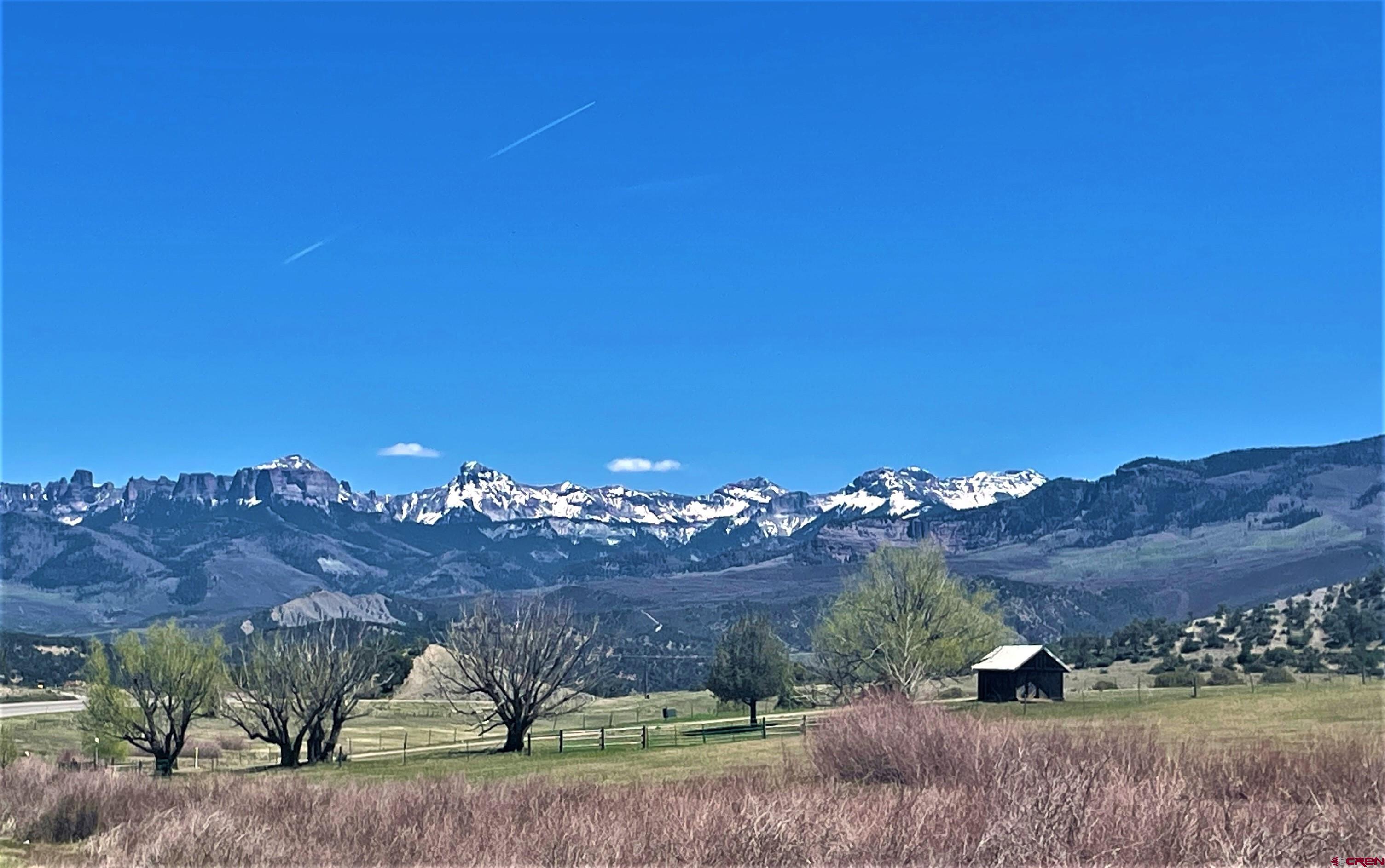 Ridgway, Colorado-35 acres of Ag land. 2 Ponds. 12 acres in Irrigation. Hay producing. Dallas Ditch. Views to Cimarrons /Loghill and Pleasant Valley. Fronts Hwy 62.