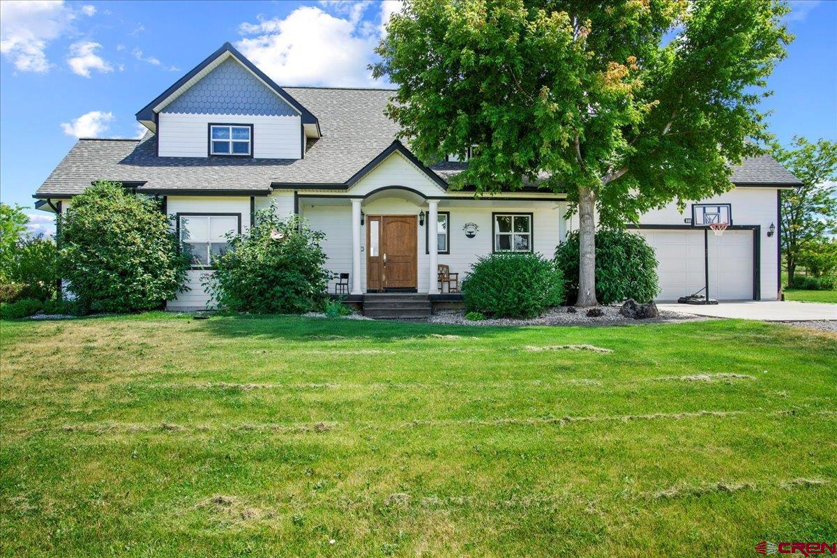 This 3200 sq. ft. custom-built home sits on a stunning 9 irrigated acre lot on beautiful Spring Creek Mesa. The home is a 3-bed 2.5-bath two story, with great San Juan views. It was built in 2004, and it wasn't just a regular build: it has a green certification, meaning it's very energy efficient. There's a corral for livestock. Great property for that hobby farm or 4-H livestock project. The field is in hay pasture. Plus you're close to thousands of acres of public land for biking, hiking, Jeeping or camping. People come from all over the world to play in this backyard.