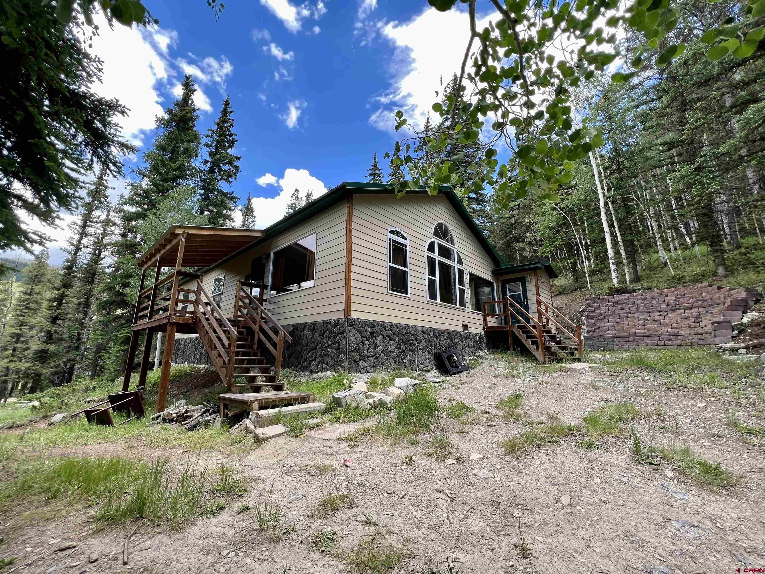 Fantastic summer home in the Town of Pitkin features 3 bedrooms/2 full baths with cozy woodstove in the living room, large open kitchen, laundry room and work shed.  Tucked away in the trees, with easy access to trail riding.  Built in 2012, great condition, tile entryway, carpet bedrooms & wood flooring too!
