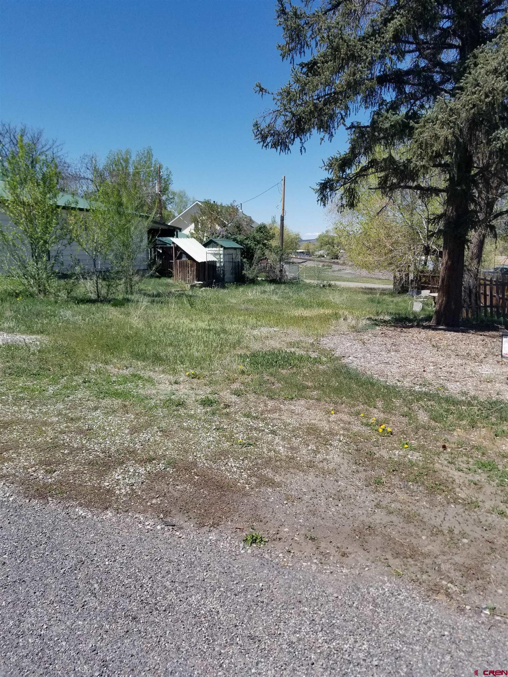 Rare opportunity to purchase a vacant lot in Paonia! Water and sewer taps installed. Electric and gas are on the property. High-speed internet, 0.3 mile to retail shops, restaurants, grocery, movie theater, live music. Paonia is home to many events throughout the year and is well known for beautiful scenery, vineyards, orchards, organic fruit/vegetables, hunting, fishing, camping, the list goes on and on. Tuesday night Arbol Farmer's Market and Louie's Blues Jam on Wednesday nights are a couple of local favorites. Call today to get your foot in the Paonia real estate market.