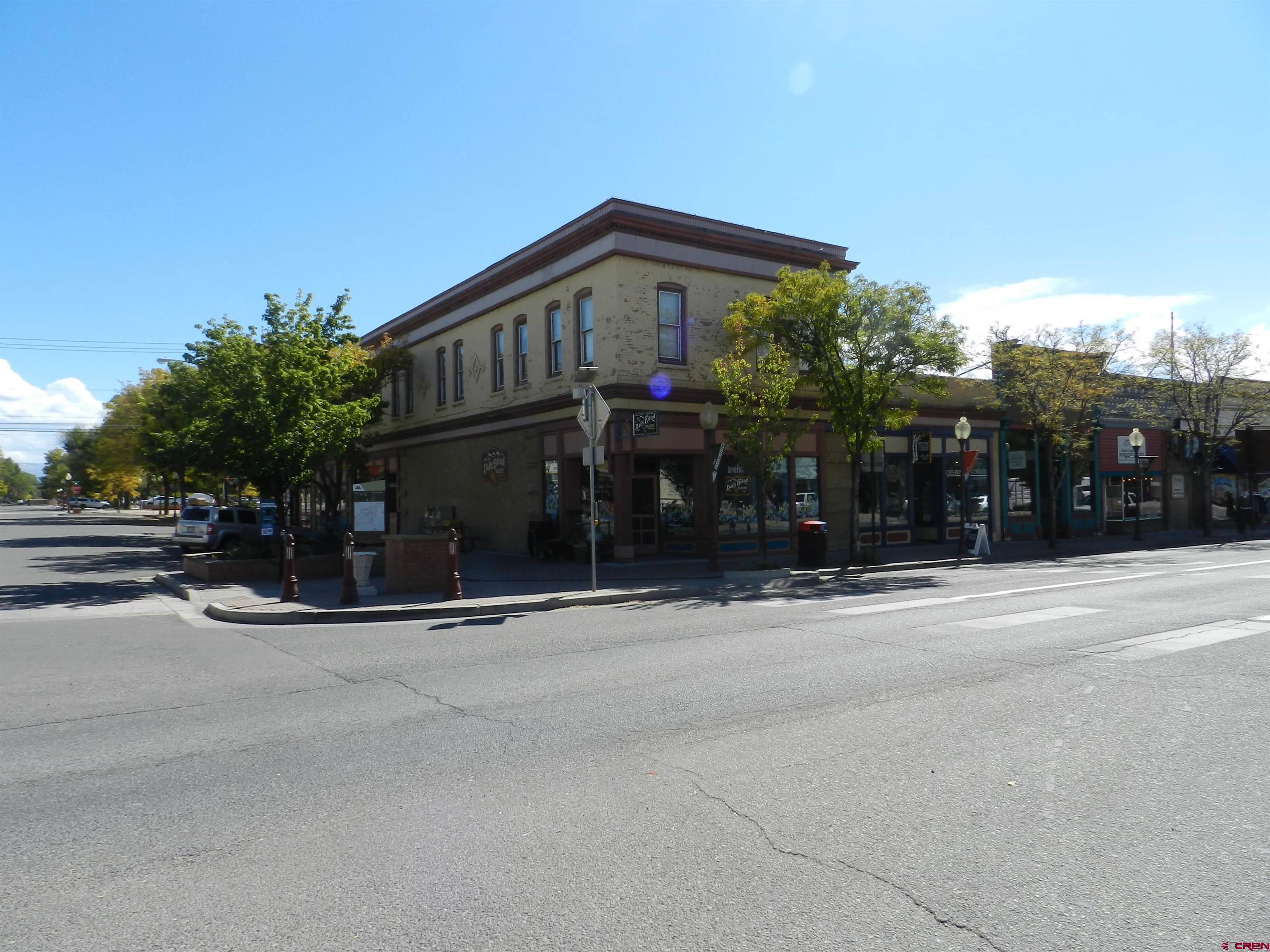 Outstanding Retail/Office Building with Ideal Main St Location!   Prime Commercial Building and Position:   Amazing location, easy access off E Main and S Cascade in the heart of historic downtown Montrose. 6,888 sq.ft. (MOL) building plus additional 3,800 sq.ft. (MOL) basement, was built in 1896 and emphasizes lots of charm from that era. 16, 18 and 20 S Cascade, each have one bathroom per unit and separate entrances. 12 S Cascade is the upper unit and features 6 office spaces, 2 bathrooms, entire floor is vacant and ready to be leased. 344 & 346 E Main St have separate entrances, ample floor space and both units share 2 ADA bathrooms, plus full basements under each unit. Zoned B-1 allows for many uses including retail, business or professional offices, restaurant, dance studio, art center or childcare facility. Great investment opportunity! Take advantage of this ideal location and space!