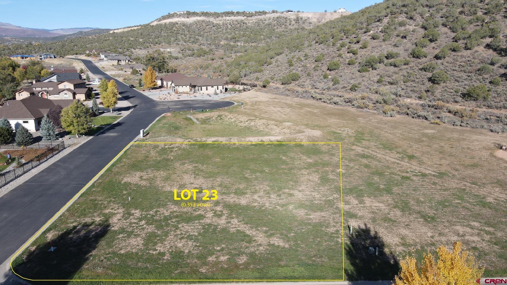 Large corner lot located in the very desirable Deer Creek Village Golf Course Community.  All utilities are to the lot with water and sewer taps available to purchase through the Town of Cedaredge. High speed, fiber optic internet alsoavailable. Close to all amenities, medical, schools, grocery store, restaurants and the Grand Mesa Art Center. Great views of the Grand Mesa, the largest flap top Mesa in the world, with over 300 lakes, hiking, cross-country skiing, down hill skiing, snowmobiling, camping, snowshoeing, etc., only a 30 minute drive.  Within walking distance to the Cedaredge 18-Hole Public Golf Course.  Beautiful scenic walking trail along the constant flowing Surface Creek for those morning and afternoon strolls.  This lot backs up to an open space which allows more room for privacy.  Come "Share Paradise With Friends and Neighbors".  Vacant lot 24 is also available to purchase MLS #799136.  RV/Boat storage available through the HOA.