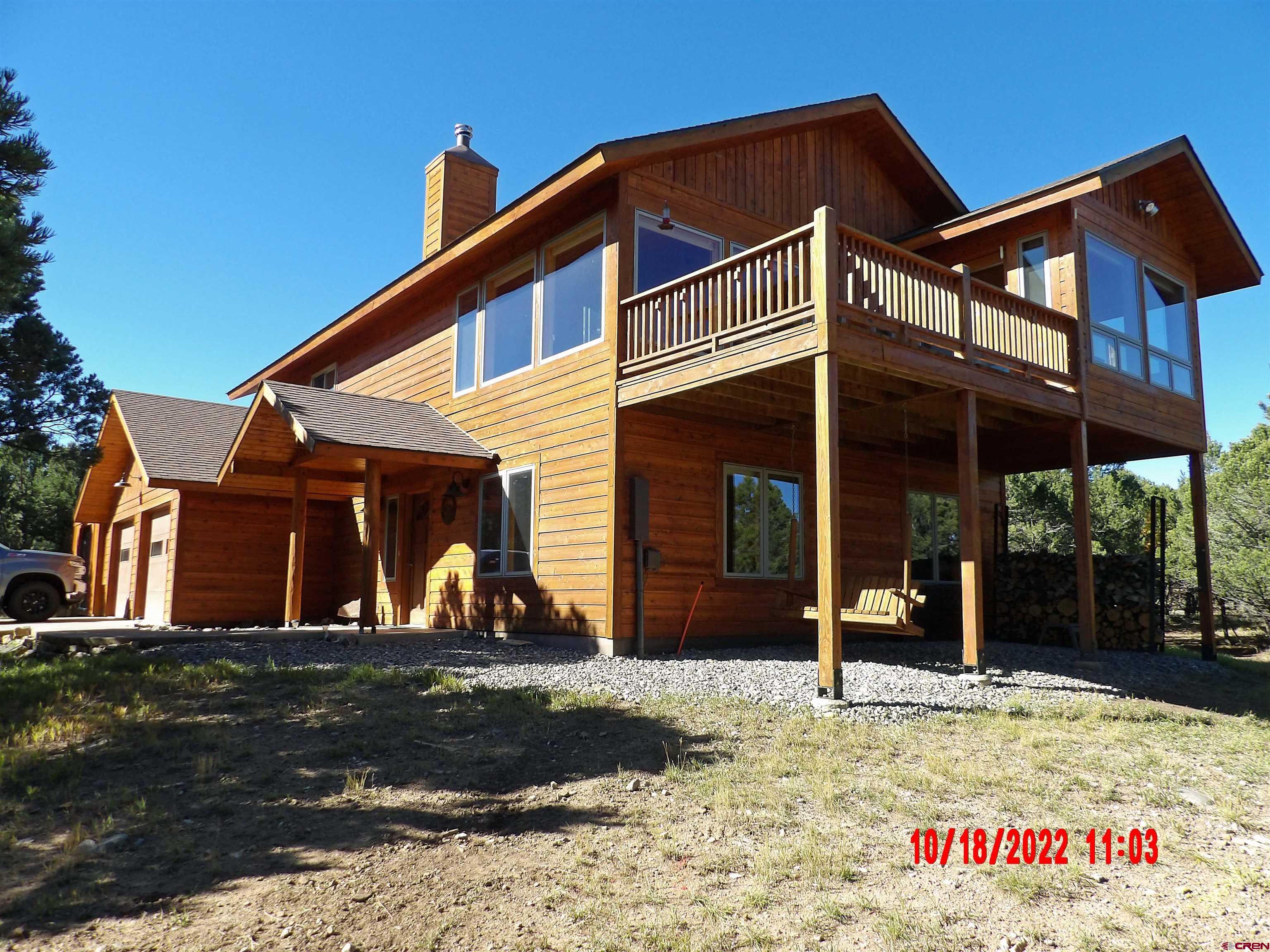 Well maintained and recently remodeled over the past 3 years.  Great views of the Cimarron Range of the San Juan Mountains, enjoy the fabulous alpenglow sunsets, the unbelievable moon rising, as well as the inspiring sunrises.  The house is very energy efficient with spray form insulation in the walls, under the lower level slab and in the attic. There are also triple pane windows and a glass front woodstove to add warmth and comfort to the living areas. Vaulted ceilings with wood beams and wood ceiling in the living room, kitchen and dining room.  The dining room has windows on 3 sides to enjoy the natural beauty of the mountains, valleys and the local wildlife.  A list of the improvements includes: repainting the interior, hardwood flooring, new carpet in the bedrooms, den, master bedroom, with extra plush padding in the den and master, full renovation of the master bath, new sink, granite counter, faucets, shower head and shower door in the downstairs bathroom. The den and master bedroom hve new ceiling fans.  The kitchen changes are: leathered granite counter tops, new stove/oven, whisper quiet dispposal, new sink and faucet, new dishwasher, new bronze cabinet hardware.   Added to the property is a heated gym building (this could be used as a workshop, studio or more).  The area around the house has been cleared to meet the defensible space for wild fire requirements.  This 3 bedroom, 2.25 bath, with separate office/den/studio is move in ready.  If you like to walk and hike the Loghill Park and Recreation District has several miles of well marked hiking trails (some go along the escarpment for a couple of miles.  The pave roads are wonderful for walking and biking as well. Make sure you see this wonderful home and property, priced less per sq. ft. than other comparable homes in the area.  Access is all on paved roads, all utilities are underground. Easy and quick drive to Montrose. Montrose has one of the best regional airports in Colorado. Less than an hour to Telluride, less than half hour to Ouray and even quicker to Ridgway and Ridgway Reservoir. This property is close to all the outdoor sports activities, Great Skiing in Telluride as well as all the festivals offered in the area. GO AHEAD AND SPOIL YOURSELF BY LIVING MAGICAL AREA OF SOUTHWEST COLORADO!