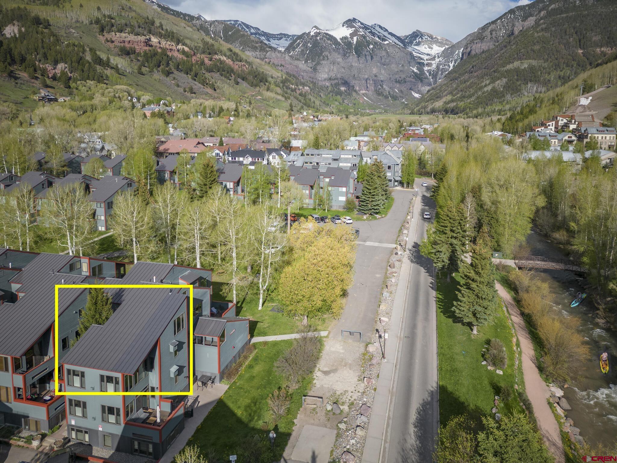 This is what you’ve been waiting for!  The rare opportunity to own arguably the best location at Telluride Lodge! Telluride Lodge is known for its premiere ski access, spacious floorplans, outdoor space and lower homeowners dues.  No detail was overlooked during a complete top-to bottom redevelopment and expansion by Richardson Construction. Positioned directly across from Coonskin/Chair 7 and San Miguel River Trail, steps from the market and Davis & Pacific Street restaurant and shops.  Unit 542 is approximately 1,236SF with three levels of elevated views, light and luxury appointments.  The upper most level is currently set up as office/flex space which can be reconfigured for additional sleeping space.  Extensive owner storage and a laundry closet are on this top level . The mid-level has a queen bedroom with vaulted ceilings, south-facing sun and tremendous views of the ski area.  A ¾ bath with custom built-ins and steam shower accommodates guests. The primary bedroom has thoughtful built-ins for two, east-facing views through a large picture window and ensuite bath with additional built-ins and steam shower.  This main living level has the same appointments, chef’s kitchen with open concept living/dining areas, gas fireplace and featuring vaulted ceilings, spectacular light and mountain views.   542 is being offered together with adjoining residence #541 in CREN MLS#801100 for a 6-bedroom slope-side compound.   Telluride Lodge Location/Amenities:  Along Galloping Goose Town Shuttle Loop Directly Across from ski lift Across from San Miguel River and River Trail 5+ acres of greenery, shared grills/picnic table Mountain Views Steps from restaurants, shops, ski rentals Common hot tubs & spa facility  Residence Amenities: Completely remodeled from the studs by Richardson Construction with insulation, drywall, in-floor radiant heat, recessed lighting, fire suppression, AV/data wiring,  Gourmet kitchens with custom milled alder cabinetry, solid surface countertops, stainless  Appliances include Thermador gas island cooktops, Thermador & Bosch wall oven/microwaves; Bosch dishwashers, wine coolers. 2 GCE parking spaces Hallway ski storage and multiple interior owner storage closets Spacious deck looking up to ski area and east to Gondola and Box canyon  This property does not have a Town of Telluride STR license, is not rented and is in beautifully maintained condition.