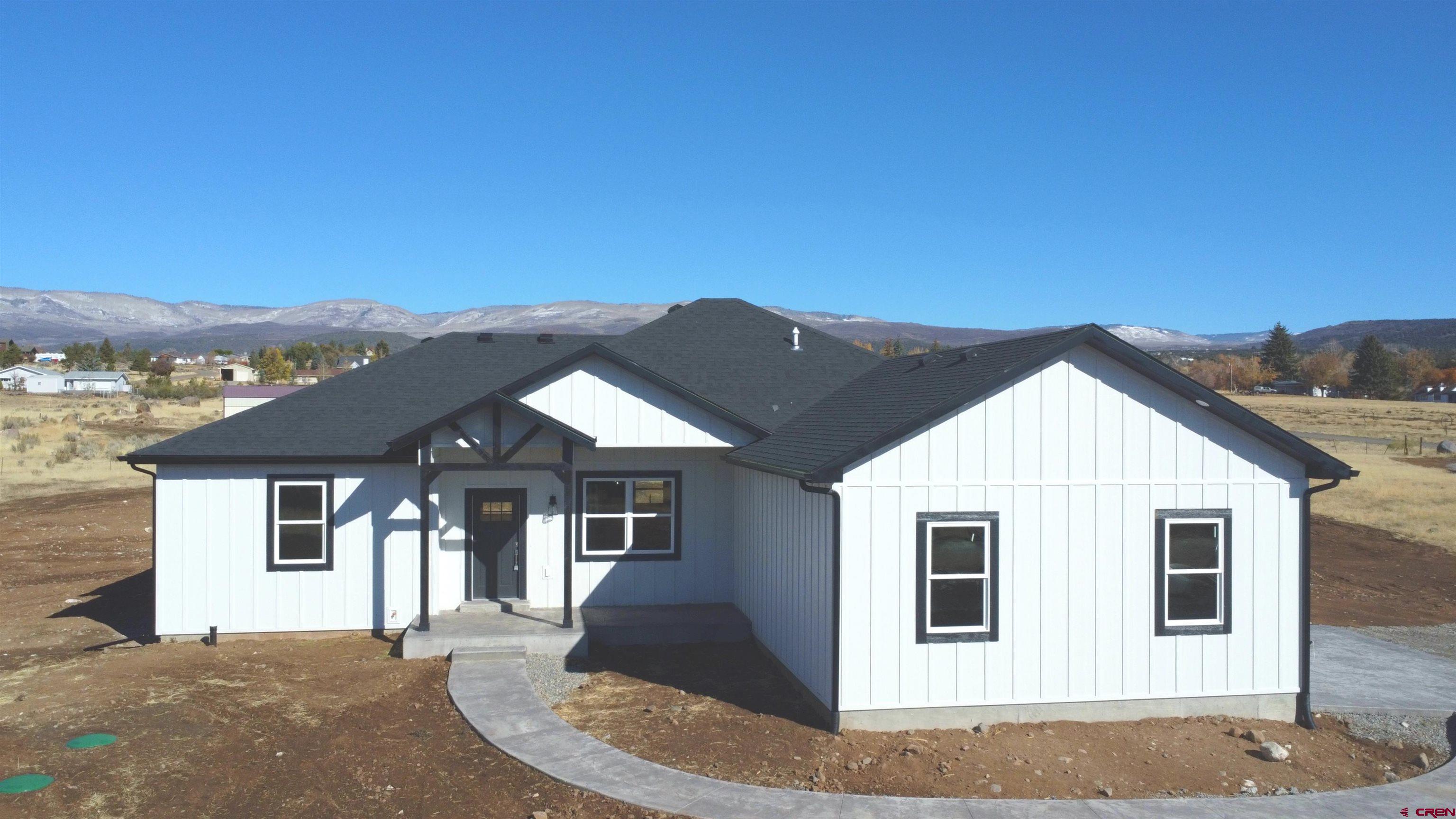 Another New Build from Jim Barnard/TradeMark Construction, LLC.  This 4 bedroom, 2 full bath home will feature 2 master suites.  This Beauty will come with Custom built cabinets and counter tops throughout.  The Kitchen, Living Area and the Dining Area has an open concept, making it easy to spend time with the family. Located North of Cedaredge on 1.8 Acres, giving you some elbow room and fantastic views.  The Cedaredge area offers many recreational activities like ATV riding, hiking, biking, lake fishing, cross country skiing, the Cedaredge Golf Course and down hill skiing at Powderhorn Ski Resort.  Small Town life, but just minutes away from the Magnificent Grand Mesa!