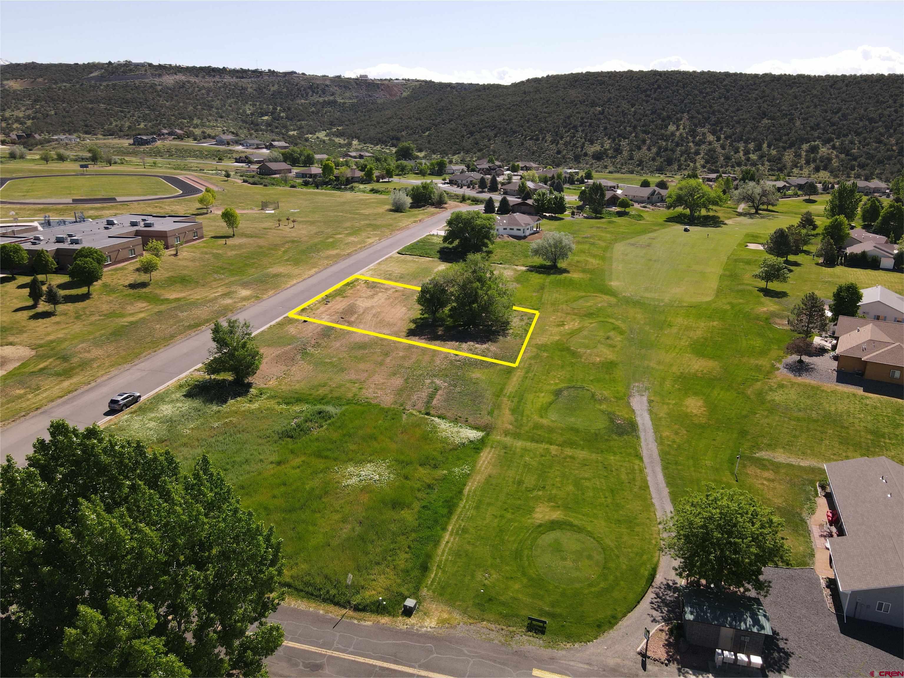 Perfect golf course lot backing up to the 5th Fairway of the Cedaredge 18-Hole Public Golf Course.  No golf membership is required to live in the golf course community.  All utilities are to the lot with water and sewer taps available to purchase through the Town of Cedaredge.  High speed, fiber optic internet also available.  Cedaredge is a very desirable community with restaurants, doctors, dentists, one grocery store, hospital within 15 miles and the Grand Mesa within a 30 minute drive.  The Grand Mesa is the largest flat top mesa in the world with over 300+ lakes.  Great fishing, hiking trails, snowmobiling, cross-country skiing, snowshoeing, camping and much more!  This lot has great views of the Grand Mesa and within walking distance to Cedaredge Middle and High Schools.  RV/Boat storage available through the HOA.