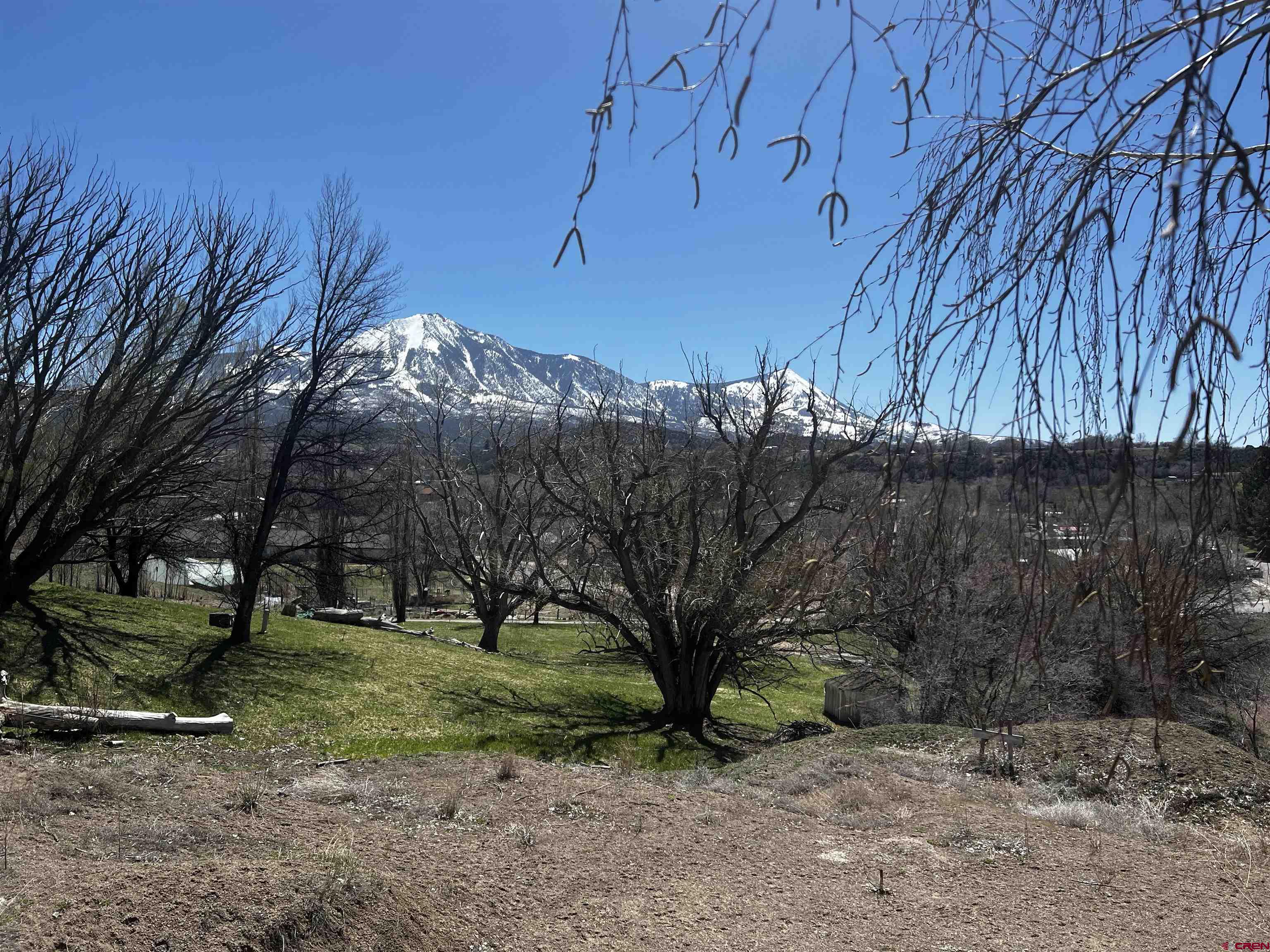 Spectacular Views of the Valley and Mt. Lamborn. Ideal building lot with a coveted Town of Paonia Water and Sewer Tap in the Apple Valley Neighborhood, the gateway to Mt Jumbo trails for biking, hiking and horseback riding. This south facing lot sits at the end of a quiet cul-de-sac in the  Apple Valley Subdivision which also provides irrigation water via the HOA. Direct access to Apple Valley Park runs along Minnesota Creek, offering Pickleball/Tennis Courts, Parcourse, Frisbee Golf, and a Playground. It's nearby the Mountain Oven Bakery for your Friday morning Pastry pick up and coffee as well as a close walk to downtown Paonia.