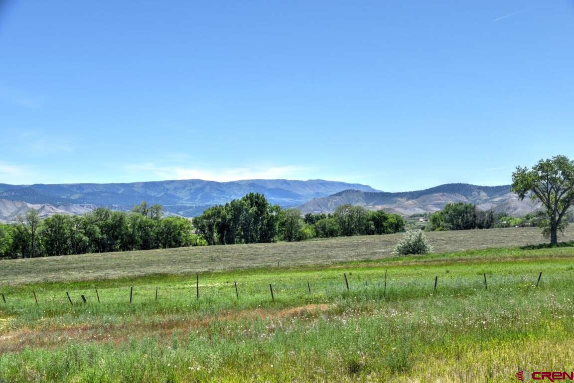 If you're in the market for a flexible property that can cater to a variety of needs, look no further than Tract 3 of Circle H Ranch. This stunning 71.5-acre plot boasts 45 acres of fully irrigated land that is currently utilized for hay production. Whether you're seeking to raise livestock, start a horse farm, or construct a home with awe-inspiring views, this land is the perfect fit for your aspirations. Additionally, investors may request permission to subdivide and develop the property, providing the opportunity for expansive lots with breathtaking vistas. The property is already connected to the city sewer line, with water taps available and all necessary utilities linked to the property line. Without a doubt, this property represents an exceptional opportunity for anyone who is passionate about ranching, farming, or constructing a home with magnificent views.