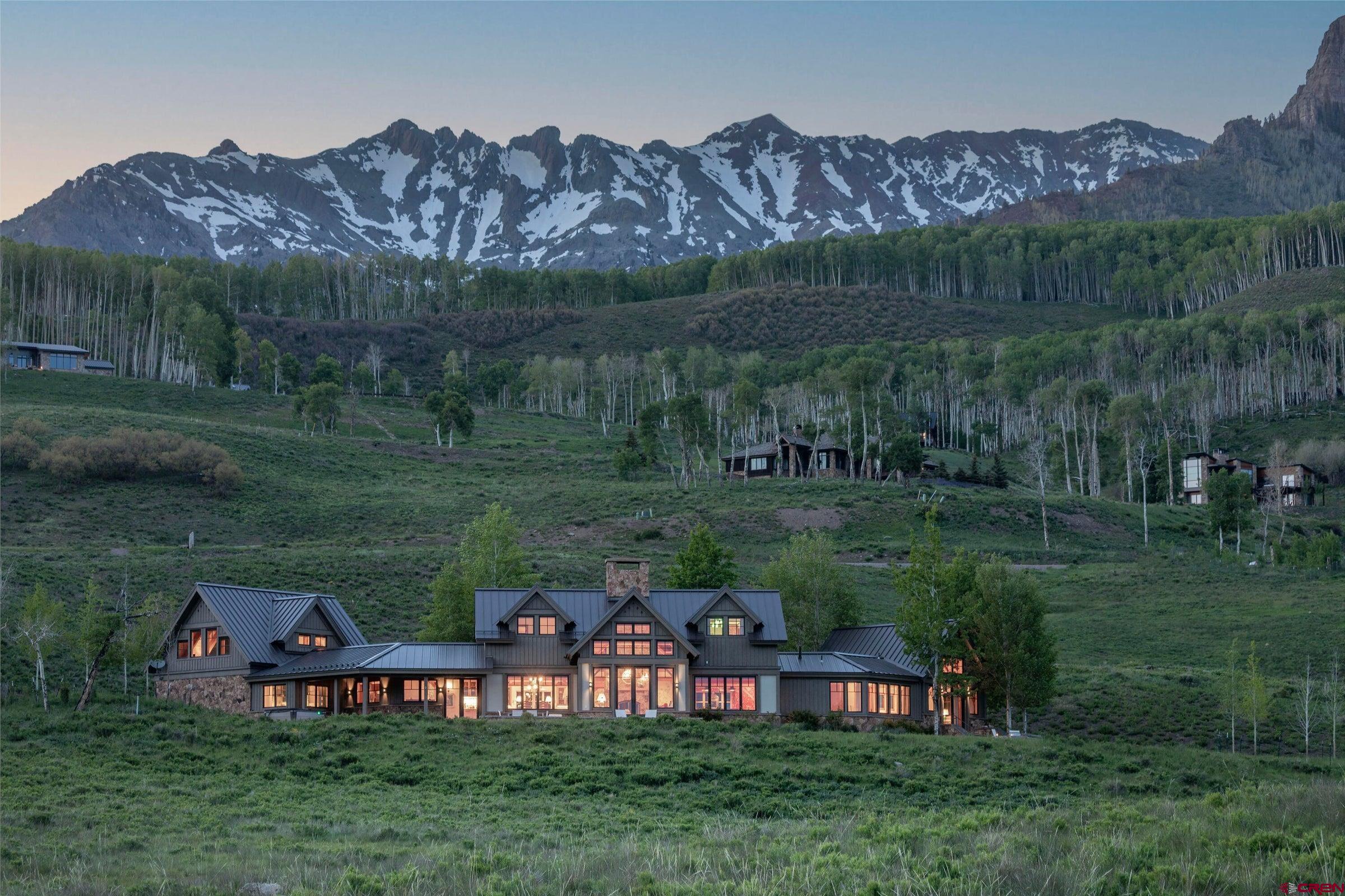 101 Josefa Ln is situated on 7 private acres in the Aldasoro Subdivision in beautiful Telluride, Co. 3 lots were joined to create one of the best settings in all of Telluride, yet only 10 minutes from both town and MV. A stately driveway leads up to the home, nestled on an expansive flat perch overlooking 50 acres of permanent open space, where herds of elk congregate in yearly migration. The south facing house is drenched in sun and its 270-degree views span from Campbell Peak across the box canyon and ski resort to Mt Wilson and beyond. Floor-plan is mostly 1 level and perfectly situated to have sweeping views from nearly every room. This stunning mountain home has recently undergone a complete transformation, remodeled extensively with gorgeous custom finishes and modern amenities.