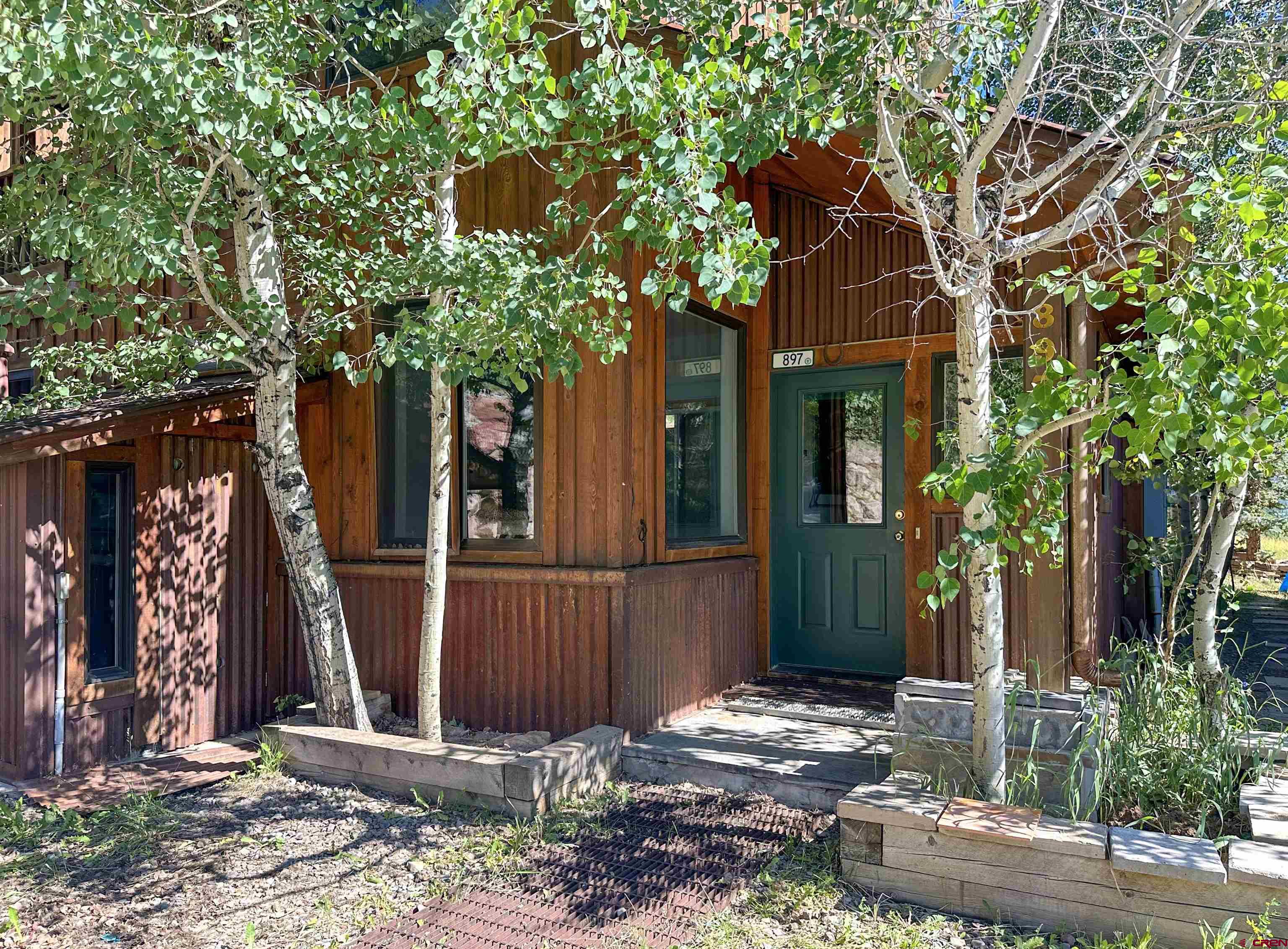 Seller is requesting all highest and best offers until Friday 8/25 at 5 pm MT and will respond no later than Monday 8/28 by 5pm MT. Affordable opportunity for a qualifying local Buyer! Light and bright, ground level, two bedroom/1 bath deed restricted duplex unit in the local's neighborhood of Two Rivers. Bask in the sun and take in views of Sunshine Peak from the south facing patio or stroll down for late afternoon fishing in the South Fork of the San Miguel River.