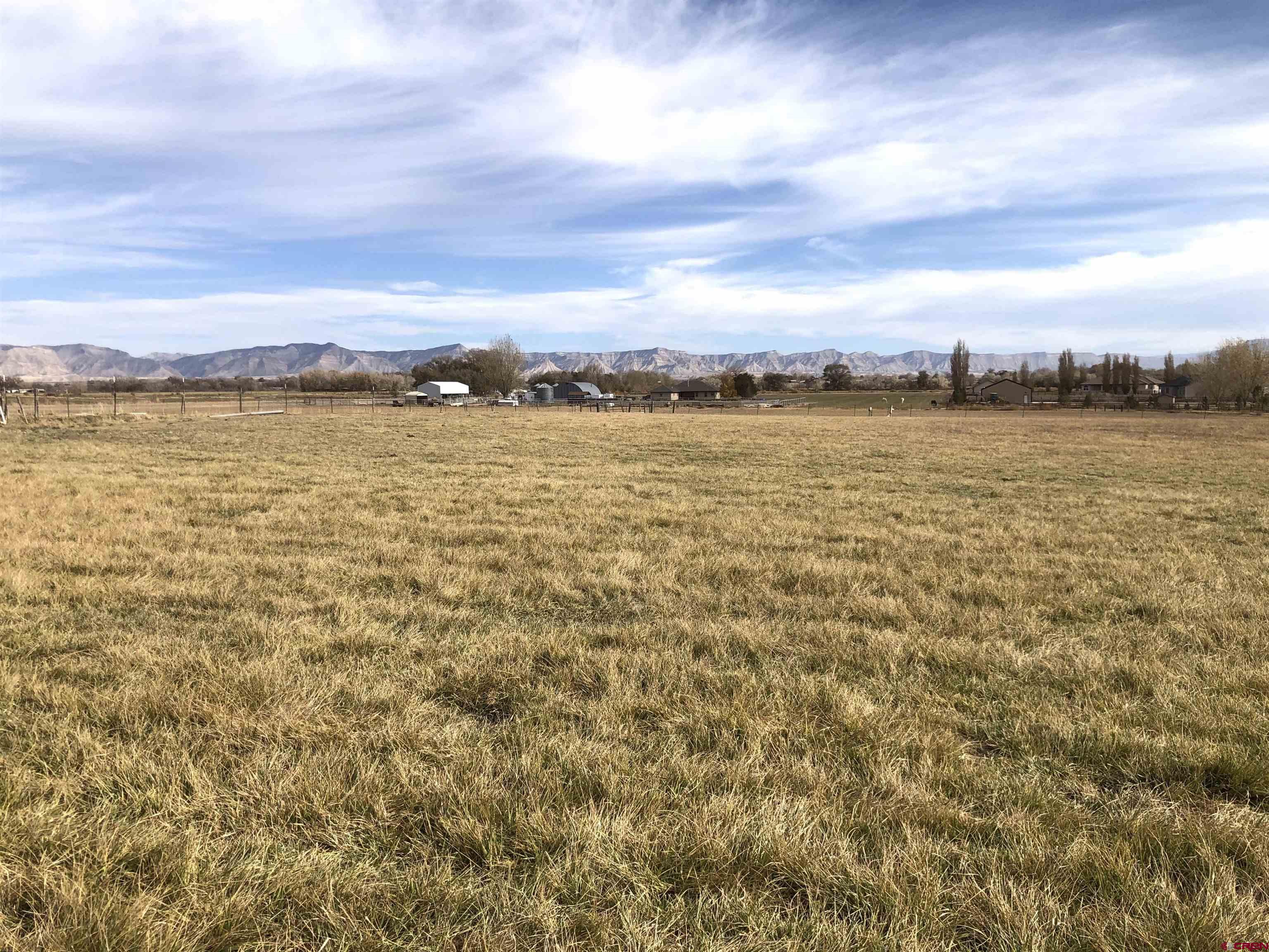 Excellent opportunity for homebuilders seeking very nice 1-acre building lots with irrigation near Fruita and within Mesa County limits! This newly-approved subdivision is located just northwest of Fruita and the Lazy V subdivision; it's 1/4 mile west of 17 Rd at L1/4 Rd. There is a possibility of owner carry for a quality builder with a sound reputation and documented financial stability. Lots may also be purchased individually:  Lots 2-4 at $205,000 and Lots 5-9 at $195,000.  Construction of the road and utilities is currently underway.