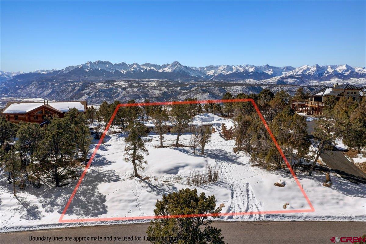 Captivating Mountain View Lot on Pine Dr, Ridgway, Colorado  Embrace the serenity of the Rocky Mountains with this extraordinary real estate opportunity! Nestled on Pine Dr in the picturesque town of Ridgway, Colorado, this  lot offers a unique chance to build your dream home on the escarpment, providing breathtaking panoramic views of the majestic San Juan Mountains. This lot has tree mitigation completed and foundation has been excavated.  It comes with home plans and an engineered septic so you are way ahead of the game in getting a home completed,  Water tap is installed and utilities lines ran to the home.  Key Features:  Prime Location: Located on Pine Dr, this lot sits on the escarpment, offering an elevated perspective of the surrounding landscape. Enjoy the tranquility of the mountains while being just a short drive from the charming town of Ridgway.  Spectacular Views: Wake up to awe-inspiring sunrises and unwind with stunning sunsets over the San Juan Mountains. The unobstructed vistas from this property are sure to captivate nature enthusiasts and those seeking a peaceful retreat.  Size and Versatility: Boasting a generous size, this lot provides ample space for crafting your ideal mountain escape. Whether you envision a cozy mountain cabin or a luxurious retreat, the possibilities are endless.  Outdoor Recreation: Ridgway is a haven for outdoor enthusiasts. Revel in the proximity to world-class hiking, biking, and skiing opportunities. Ridgway State Park and the Ouray Hot Springs are just a short drive away, offering year-round recreation.  Charming Community: Experience the warmth of the local community in Ridgway, known for its friendly atmosphere and vibrant arts scene. Explore the town's shops, galleries, and restaurants, all while surrounded by the stunning natural beauty of the region.  Utilities and Access: The lot is ready for development with essential utilities easily accessible. Paved road access ensures convenience while maintaining a connection to the rustic charm of the area.  Seize this rare opportunity to own a piece of paradise on the escarpment of Ridgway, Colorado. Immerse yourself in the beauty of the San Juan Mountains and create a legacy property that will be cherished for generations. Don't miss out on this chance to make mountain living your reality!