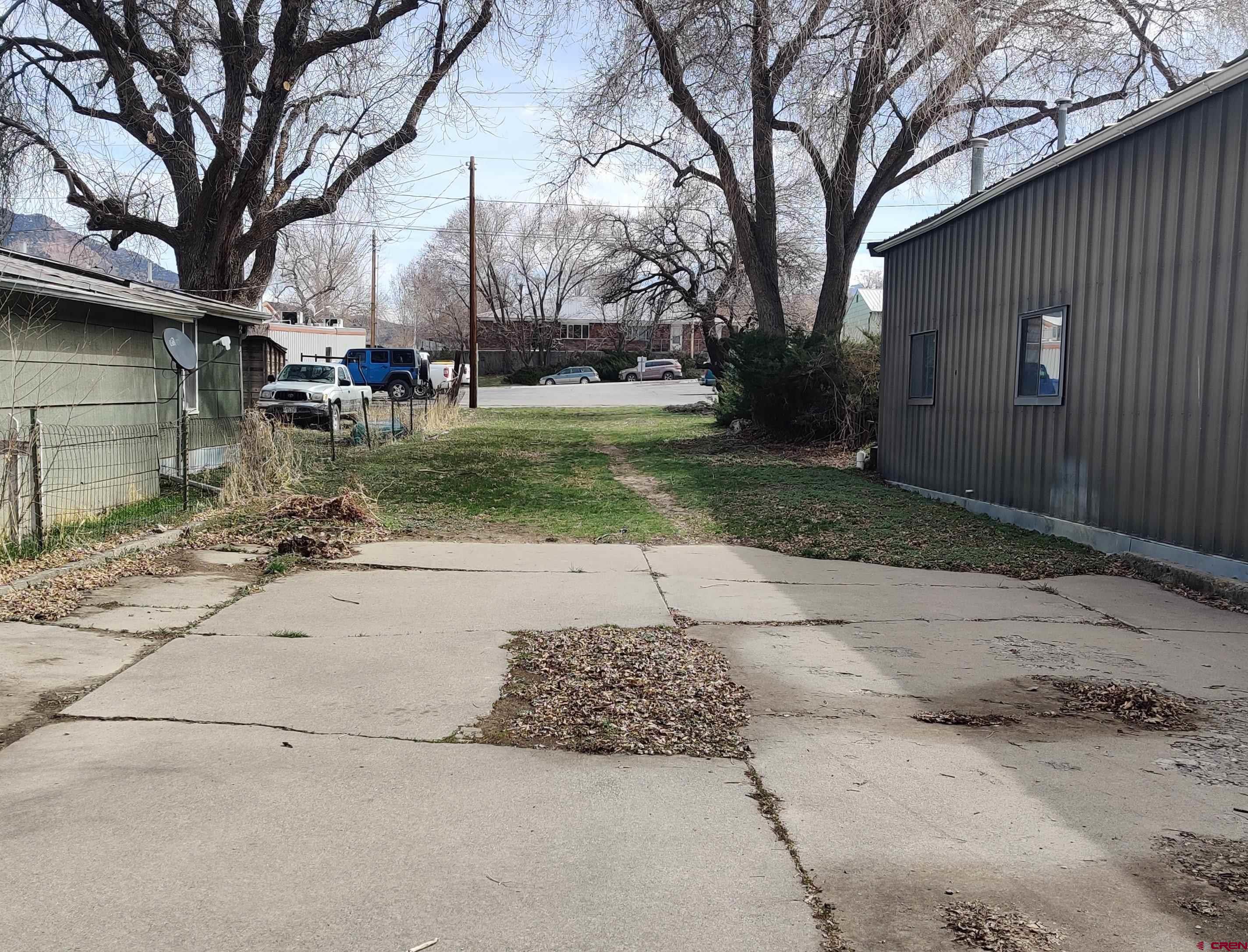 We don’t see many of these:  a prime commercial lot in the heart of Paonia’s beautiful Grand Avenue business district! The .06-acre property comes with paid water and sewer taps. C-1 zoning means dwelling units are allowed if secondary to business use.