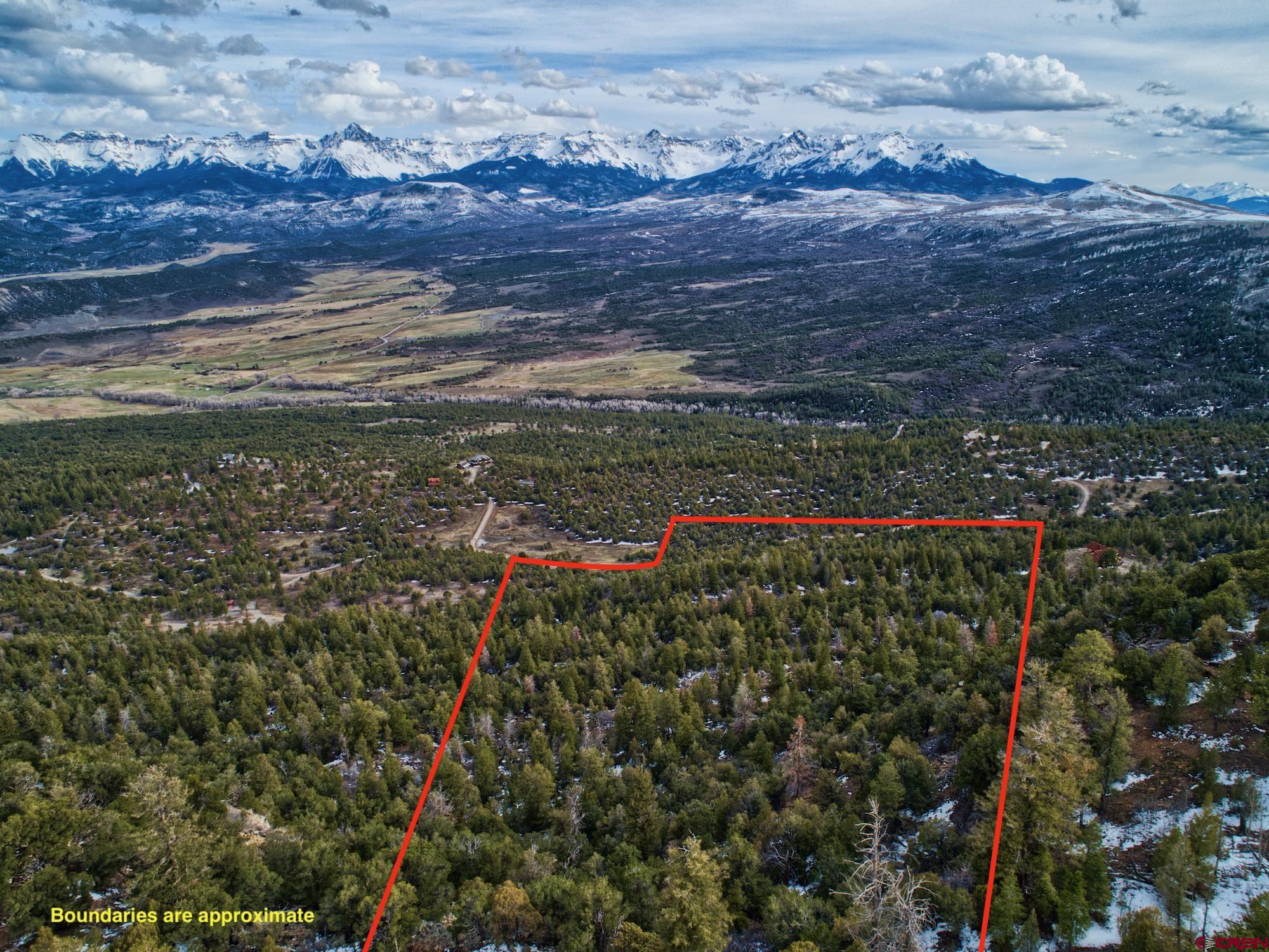 This 35 acre, beautifully contoured parcel is the premier view lot available on the market today! Located in the famous Pleasant Valley--on the way from Ridgway to Telluride, Lazy Dog Ranch has some of the Area's most glorious homes. Both full timers as well as second home owners love the sweeping views of both the Cimarron Range to the east as well as the Sneffels Range to the south. Ridgway is just a short distance away, and down the road you'll access hot springs at Orvis and Ouray. Telluride is just on the back side of Mount Sneffels and CR 24 hooks directly to Highway 62, which leads over the top of Dallas Divide. This lot is ideally situated, just as you reach Old Relay Road, and is located above as well as below the road. There are several building sites on the parcel, and one slightly above the road would be especially dramatic, so that you could use the area below Old Relay Road as a staging area for your construction. The lots in Lazy Dog are easy to build, with good soils for foundations and septic systems. Excellent access to the best area utilities, including San Miguel Power, and Tri County Water. There is excellent maintenance through the HOA of the road for year round access. Come see this extremely high quality property today, and start planning your dream home!