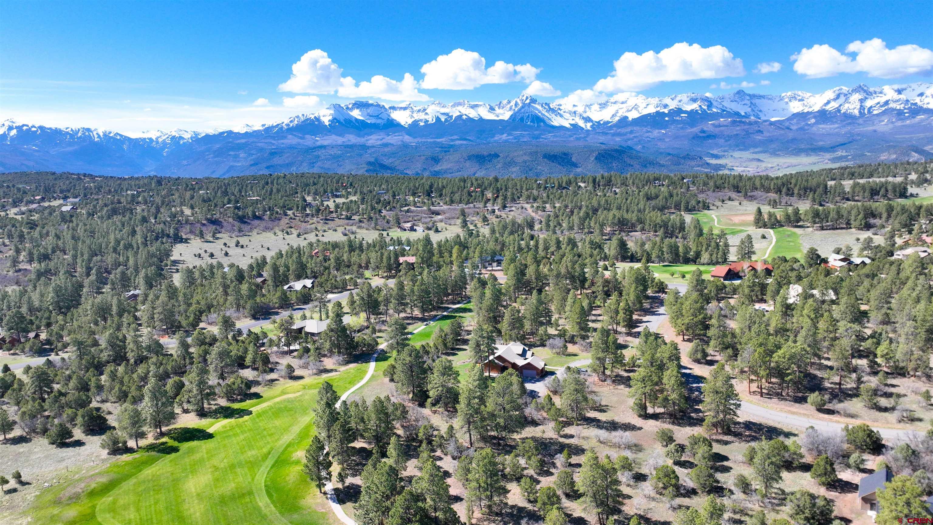 This lot, conveniently situated on the 7th Fairway at Divide Ranch & Club, offers ease of construction and immediate access to the golf course. Enjoy picturesque views of the Cimarron and Sneffels Ranges while deciding whether to admire the green or watch players . With the ability to step out of your door and onto the golf course, this presents an excellent opportunity to own a prime location within this breathtaking golf community.
