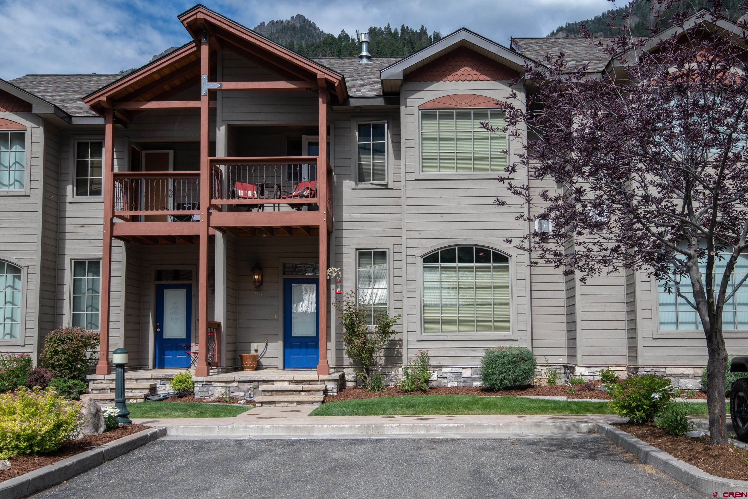 Never on the Market Before & Top Quality!!  This is a beautiful Turn Key Townhome with spectacular views of Twin Peaks, along with a view everyone is looking for … Mt. Abrams.  Entry into the Townhome takes you to the beautiful family room including a gas log fireplace.  The open floor plan offers a spacious kitchen with custom cabinetry along with an island for additional storage and serving.  There is a separate large dining room where you gain access to a large deck overlooking the Uncompahgre River.  There you can enjoy your evening meal while taking in the views of another great view the Twin Peaks.  Upstairs is where you will enjoy your large Master Suite with wall-to-wall closets including a gas fireplace, walking out on your balcony, a great place to have your morning coffee.  Upstairs also includes two guest bedrooms that share a large full-size bathroom.  A bonus room is located downstairs, that also has a ½ bath attached.  The entire home has radiant floor heat, which is very efficient for Winter time in Ouray.  Downstairs you will also find an extra-large double car garage.  Again, the home is sold completely FURNISHED!