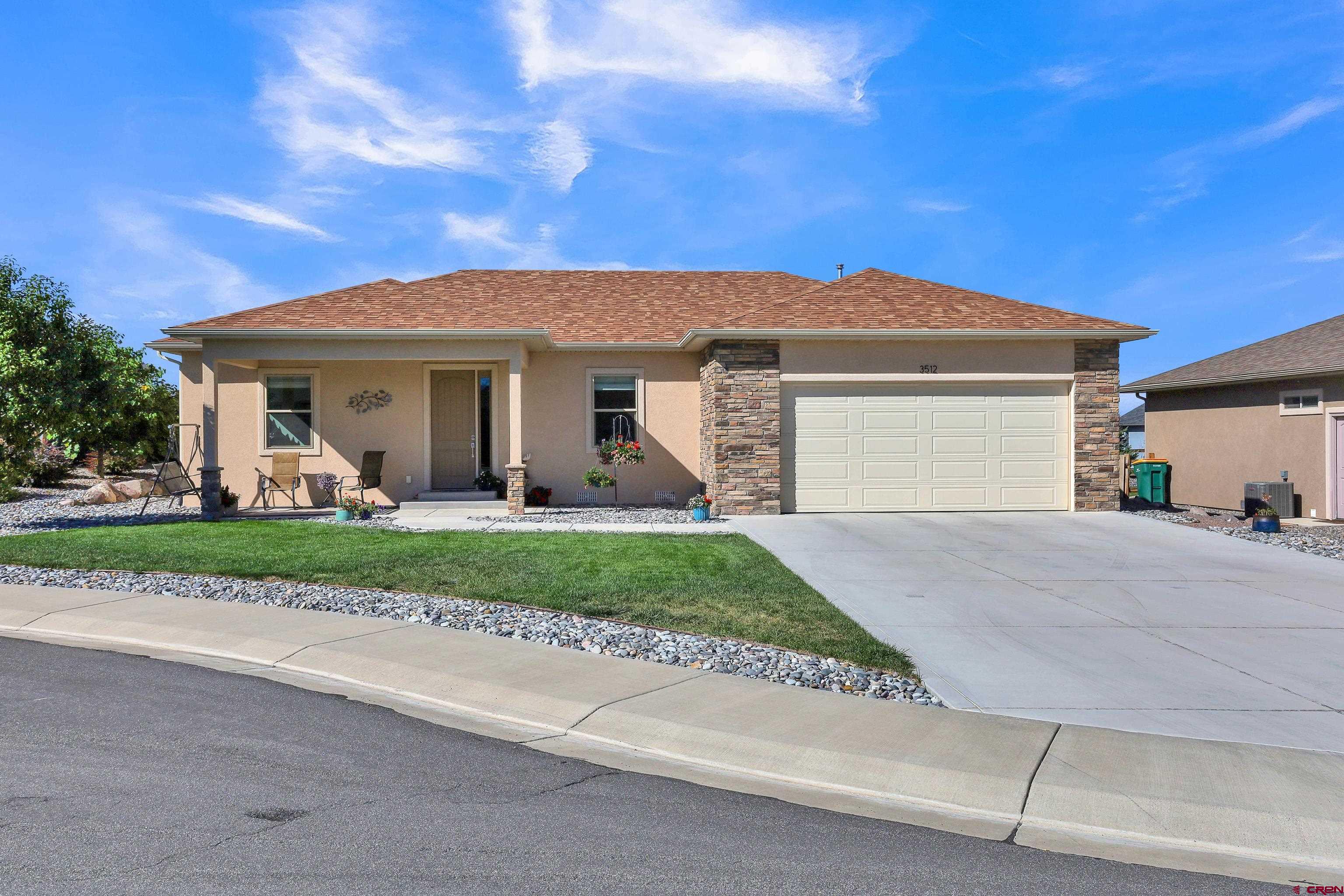 This well-maintained, one-owner, semi-custom home was built in 2018 by a local builder.  It has many upgrades,  including stunning custom Amish hickory hardwood flooring, alder cabinetry, acrylic stucco, aluminum fascia, soffit, and gutters.  The open floor plan is great for entertaining.  There is a large laundry room and two covered patios where you can enjoy Montrose's beautiful weather.   The oversized two-car garage offers plenty of storage, and the extra-long driveway is great for additional parking.  Take advantage of this opportunity to make this beautiful property your next home.