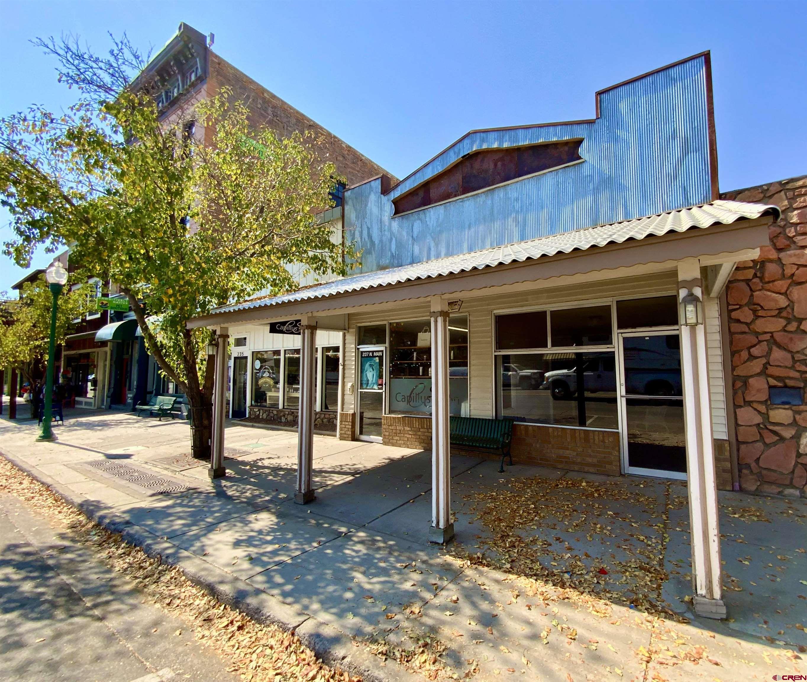 Commercial property located in the heart of Gunnison’s vibrant Central Business District offers a prime location for various business ventures.  With 3,125 square feet of open space, the property is ideal for retail, office, or mixed-use purposes.  Its proximity to the central hub of town makes it highly visible and accessible to both locals and visitors.  The highway 135 frontage offers excellent visibility from the main road and this property benefits from significant foot and vehicle traffic, ideal for businesses that rely on high visibility.  Building is equipped with 3-phase power and is ready to accommodate a variety of commercial uses, including light industrial, manufacturing, or businesses requiring heavy electrical equipment.  The building is outfitted with a natural gas heating system, ensuring efficient and cost-effective climate control throughout the year, especially important during Gunnison’s colder months.  Building upgrades to the water infrastructure add further value to the property making it ready for immediate occupation or further development with minimal upfront costs.  Given its central location, robust infrastructure, and highway frontage, this property is well-positioned to attract businesses seeking high visibility and modern utility systems.  Whether you are looking to open a retail store, restaurant, or professional office, this property provides a solid foundation for long-term success in Gunnison’s growing commercial market.