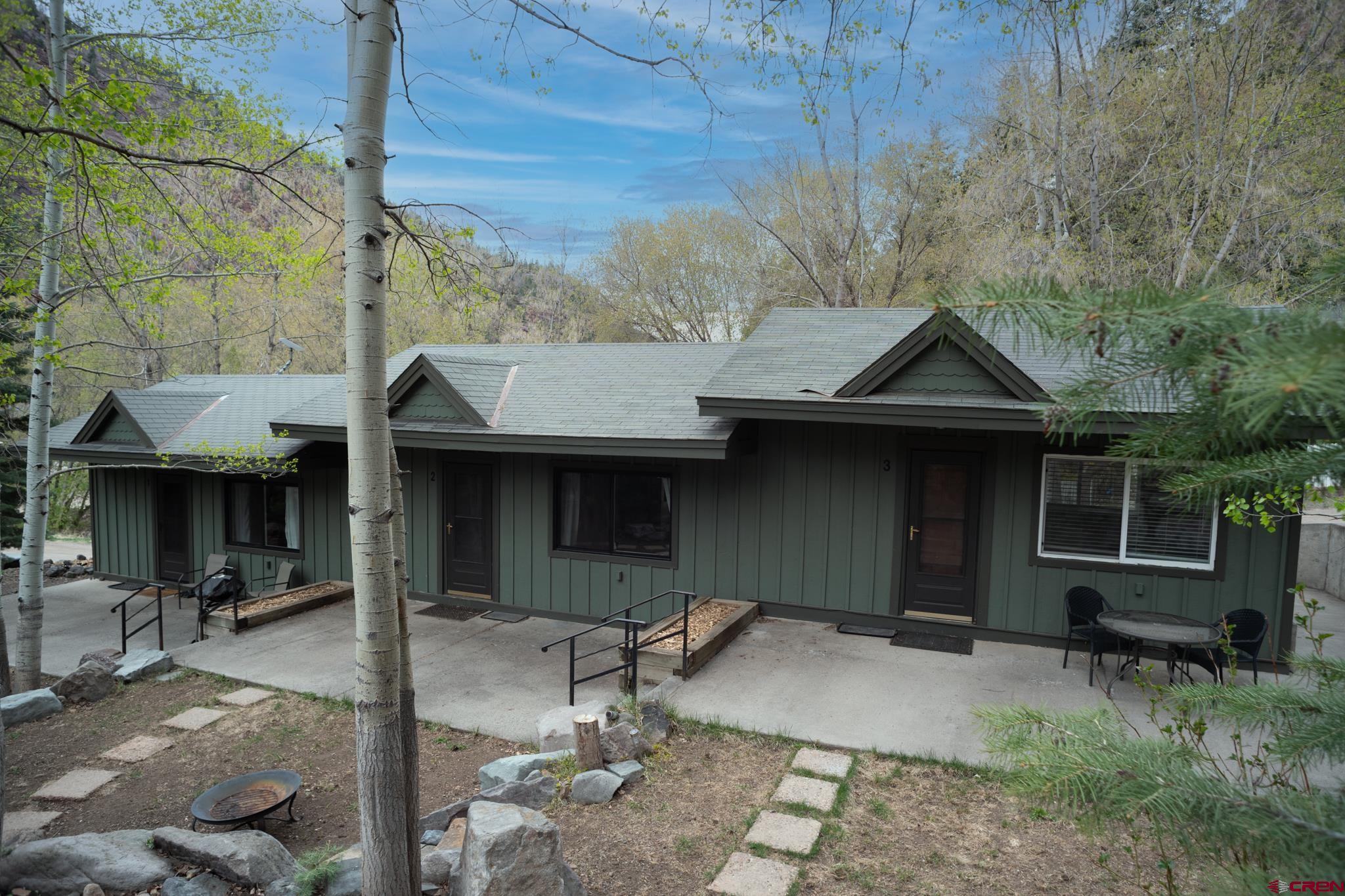 Three NEWLY RENOVATED studio apartments on an extra large lot. Each unit has a designated parking space. They are all equipped with their own kitchen and bathrooms! The oversized court yard is surrounded by aspens, lots of outdoor space to relax and bbq. Currently used as month to month, furnished rentals on airbnb. Each unit nets a minimum of $1500.00 a month in the off season. New owner could fine-tune pricing and expand marketing to VRBO. Zoned R2. MOTIVATED SELLERS!
