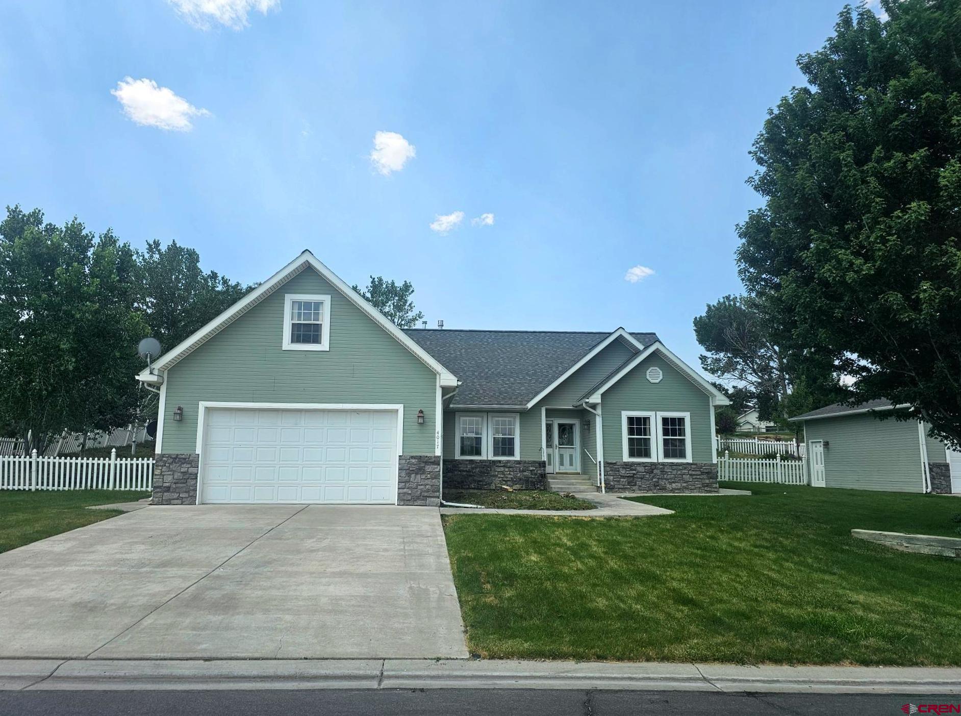 Beautiful 3 bedroom, 2 bath home is located in The Brook subdivision. The home has great views of mountains and open ag land. The home has a bonus room over the garage.  The bonus room could be used as an office or could be easily turned into a fourth bedroom by adding a closet. The back yard is fully fenced and has tiered landscaping. Enjoy the pergola on the large back patio.  The attached 2 car garage has lots of built-in storage and a handicapped lift to the main level. The detached over-sized 1 car garage has tons of built-in storage and a work bench. Lots of off street parking.  HOA with irrigation water.