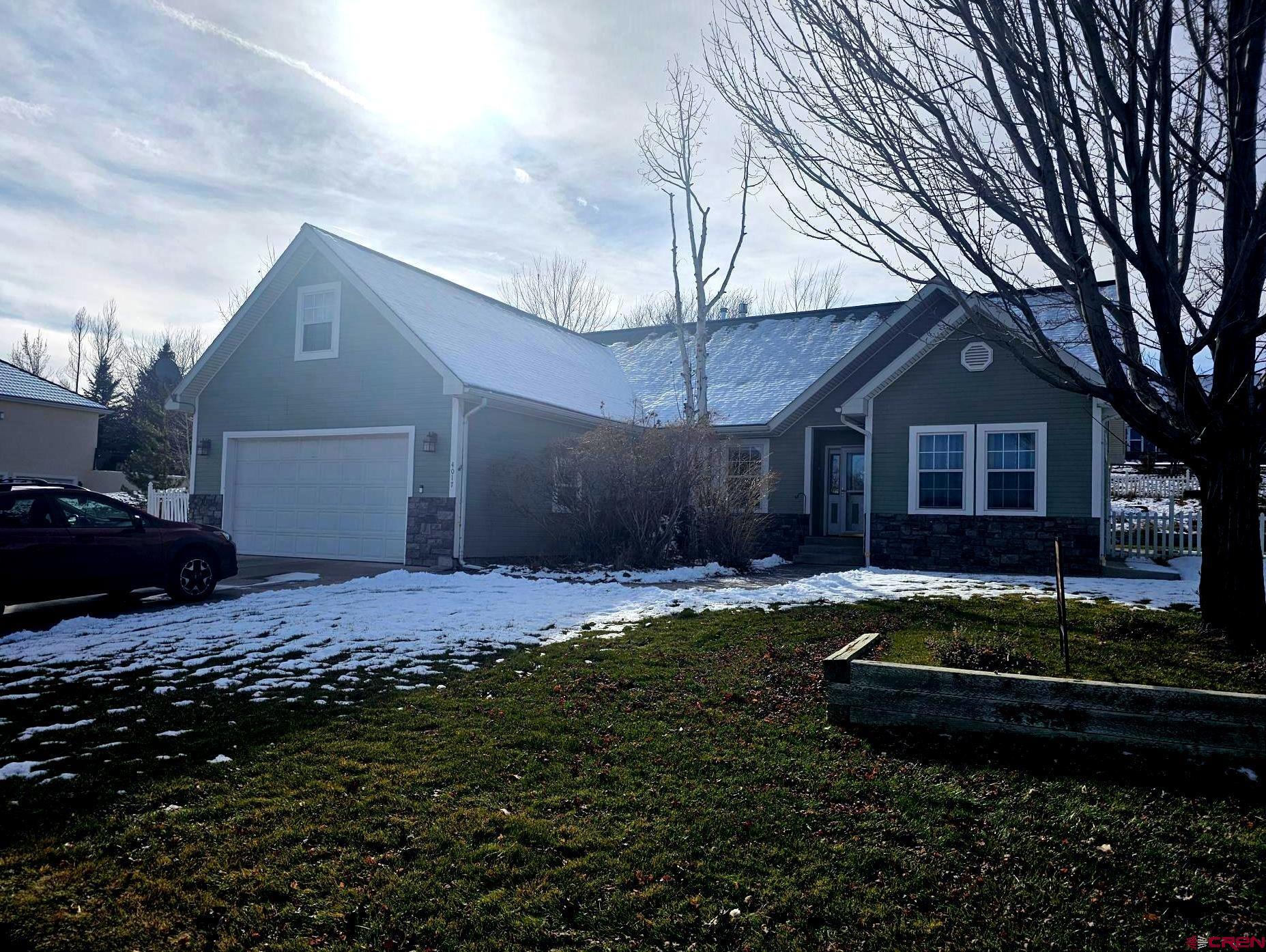 Beautiful 3 bedroom, 2 bath home is located in The Brook subdivision. The home has great views of mountains and open ag land. The home has a bonus room over the garage.  The bonus room could be used as an office or could be easily turned into a fourth bedroom by adding a closet. The back yard is fully fenced and has tiered landscaping. Enjoy the pergola on the large back patio.  The attached 2 car garage has lots of built-in storage and a handicapped lift to the main level. The detached over-sized 1 car garage has tons of built-in storage and a work bench. Lots of off street parking.  HOA with irrigation water.