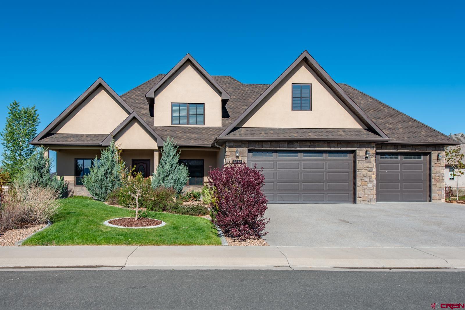 PRICED TO SELL  Your Colorado lifestyle is here.  Experience The Bridges community.  It is all here.  The renowned Bridges Golf Course, Fine dining, a number of walking and biking paths all amentities are for your enjoyment.  The Great Room is very spacious with high ceilings, hardwood floors, and a beautiful stone gas fireplace. This leads to a fabulous large sunroom with windows galore and two egress doors to the back patio or lawn area.    The primary bedroom and on-suite bathroom on the main floor is very desireable.  Two separate multi drawer vanities, granite counters, tile floors, walk in shower and large soaking tub. The main floor also provides a private office, formal Dining Room and  1/2 bath. Additionally, there are 3 bedrooms upstairs and full bath.    Cherry cabinets, stainless appliances and granite countertops are all compliments to the well planned kitchen.  The sellers had a custom booth built for the eating area off the kitchen.   In the last year, the sellers have freshly painted the entire interior, extended the back yard fencing, planted over a dozen trees, enhanced the landscape plus had a large custom patio built out of large stone slabs.  Unique and beautifully done.  This home is ready for entertaining and guests or just someone that enjoys space and comfort. The Solar Panels are paid in full and seller said the electric bill runs appprox $40 per month.  Total Bonus for the new buyer.  Once you come see this beautiful home, you won't want to leave!