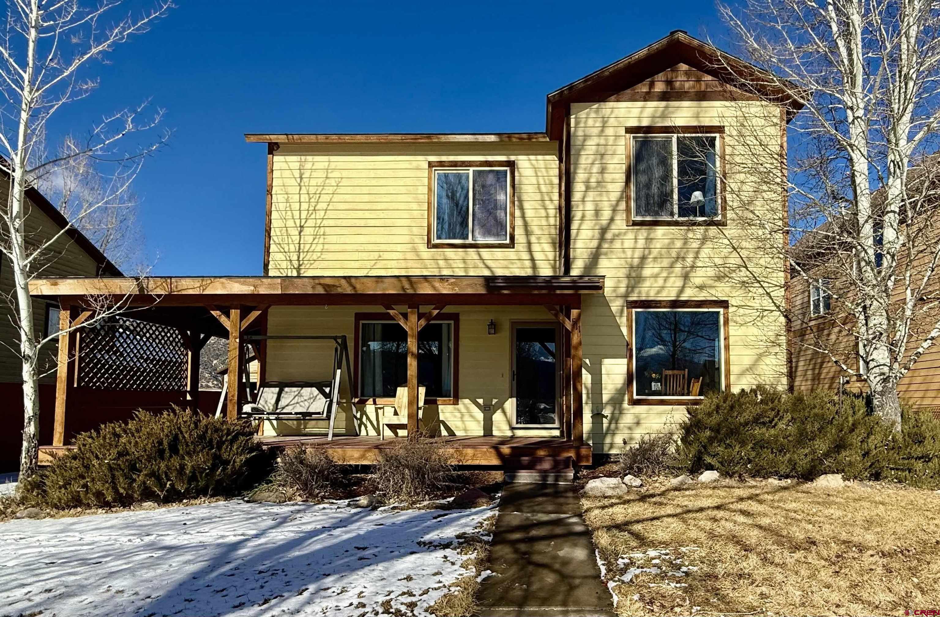 Charming Mountain Town Retreat! Nestled in the heart of Ridgway, CO this beautiful 3-bedroom, 2.5-bath home offers the perfect combination of comfort, functionality, and mountain living. Relax on the expansive covered wrap-around patio, where you can take in stunning views of the surrounding natural beauty year-round.  The interior features a spacious and well-designed floor plan with a modern kitchen equipped with stainless steel appliances. Ample storage throughout the home ensures convenience and organization.  The partially fenced backyard provides privacy and a safe space for pets or outdoor activities, while the detached 2-car garage offers additional storage and functionality.  This property is ideal for year-round living or as a peaceful mountain retreat, with its close proximity to local amenities, outdoor recreation, and the charm of Ridgway and nearby Ouray.  Don’t miss your opportunity to experience mountain living at its finest. Schedule a showing of 511 Marion Overlook today!