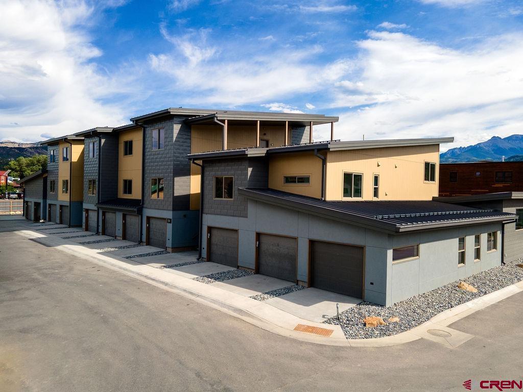 New Construction! This is an upper level two bedroom Penthouse with outstanding views.  Perfectly situated as the only Ridgway residential project on the Uncompahgre River, Riverfront Village offers quick highway access to Telluride, Ouray, Silverton, and Montrose while a stroll down the river trail leads to downtown shops and restaurants. A certificate of occupancy for the 38-unit project is expected in July 2025. Take advantage of early pricing in this opening release! This unit has huge direct Box Canyon views into Ouray, a two-plus car garage, Air Conditioning, south south-facing deck, only one shared wall, and is located on the second floor. The property is a construction site and all tours must be with a RRV Team member.  There are additional units available that may not be in the MLS, please inquire about more opportunities.