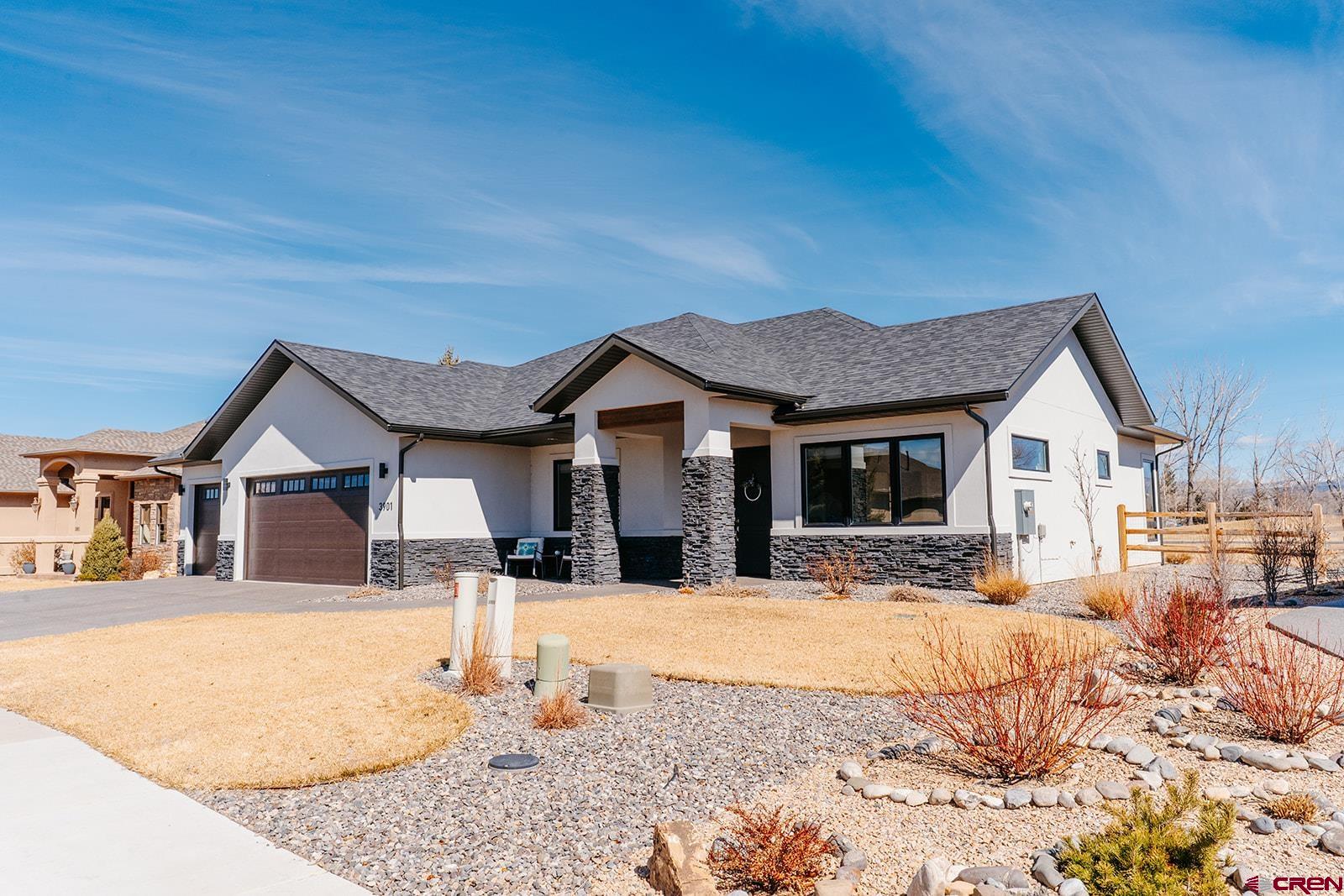 Experience Modern Living in Montrose with a Turn-Key Cobble Custom Home  Discover your dream home in Montrose, Colorado, nestled in the scenic beauty of Western Colorado. This exquisite 1-story home boasts 3 bedrooms and 2.5 baths with a smartly designed split floor plan that maximizes both space and privacy. Built in 2022 by Cobble  Custom Homes, this modern residence features an inviting open design kitchen equipped with top-of-the-line stainless steel appliances, perfect for culinary enthusiasts. The interior showcases elegant hardwood and tile flooring, complemented by oversized windows  that invite natural light into the expansive open living area. With a cozy gas fireplace as a centerpiece, this property is ideal for entertaining friends and family or enjoying quiet evenings at home. Offered partially furnished, this turn-key home simplifies  the moving process so you can settle in and start making memories right away.  Sitting on a spacious 0.25-acre lot, this property offers a fenced yard, perfect for outdoor entertaining or enjoying the serene views of the San Juan Mountains. The 3-car attached garage provides ample space for your vehicles and gear, catering to the active  lifestyle that the Montrose community celebrates. Beyond your yard, you'll discover a wealth of amenities right within your neighborhood, including a fitness center, tennis court, golf course, and a tranquil fishing pond. With close proximity to breathtaking  national parks and recreational areas such as the Grand Mesa National Forest, Black Canyon, Telluride, and Ouray, outdoor enthusiasts will find plenty of activities to indulge in—be it fishing, hiking, skiing, or 4-wheeling. This golf course home encapsulates  the true essence of Colorado living, where nature meets modern comfort.