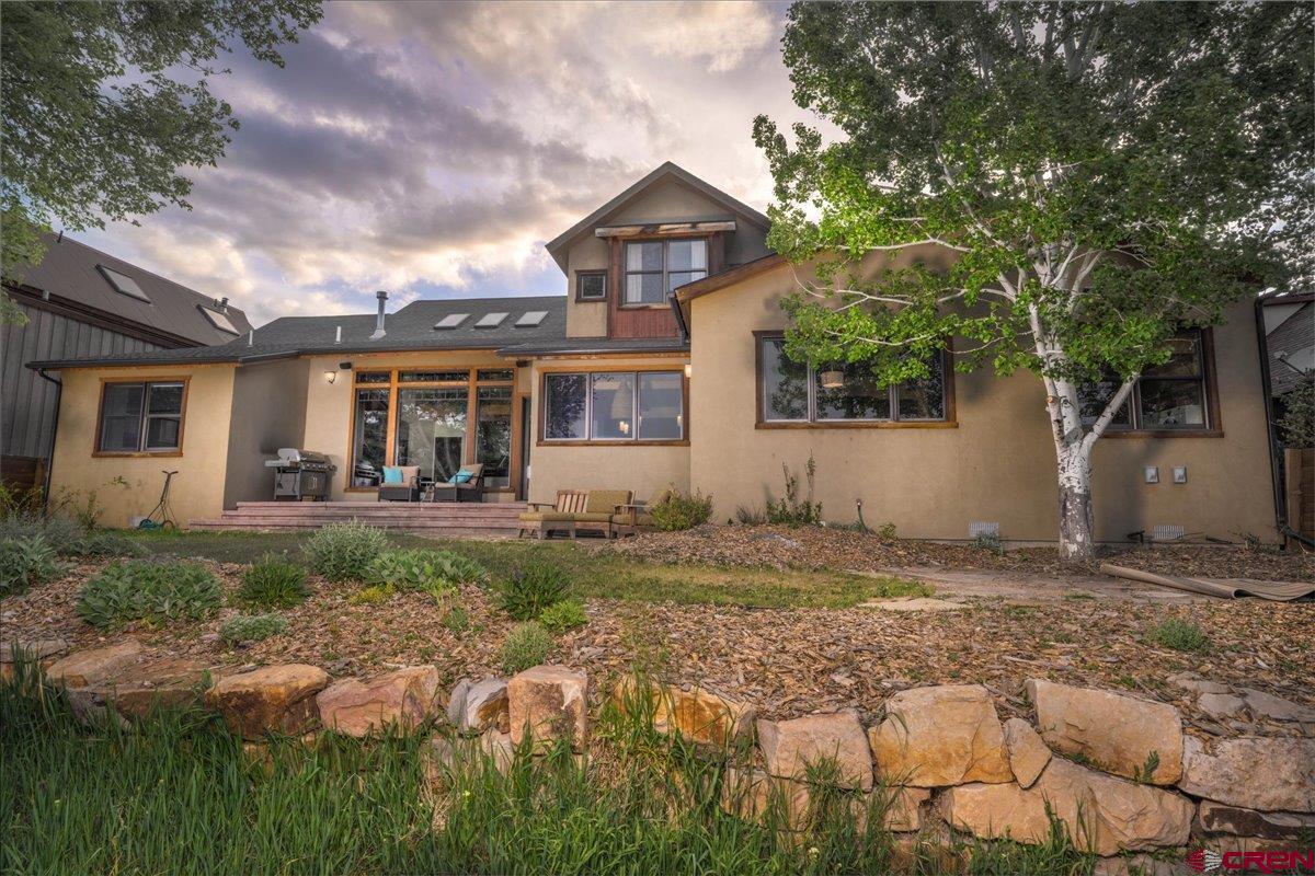 Located in one of Ridgway's most coveted neighborhoods, this custom 4-bedroom, 3-bath home sits on two oversized lots, offering unobstructed views of the Cimarron mountain range and stunning alpenglow sunsets. With direct access to a trail leading to downtown Ridgway and open space, this property seamlessly blends convenience with natural beauty. The chef’s kitchen is equipped with Wolf and Viking appliances, catering to culinary enthusiasts. Too many features to list—this is truly one of the finest homes in Ridgway. Furnishings are negotiable; art and personal items excluded. Schedule your private showing today!