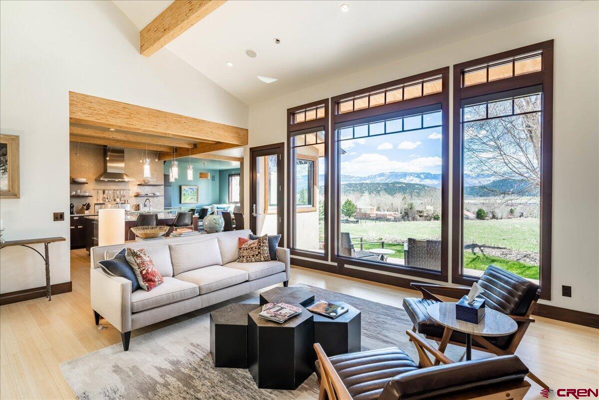 Located in one of Ridgway's most coveted neighborhoods, this custom 4-bedroom, 3-bath home sits on two oversized lots, offering unobstructed views of the Cimarron mountain range and stunning alpenglow sunsets. With direct access to a trail leading to downtown Ridgway and open space, this property seamlessly blends convenience with natural beauty. The chef’s kitchen is equipped with Wolf and Viking appliances, catering to culinary enthusiasts. Too many features to list—this is truly one of the finest homes in Ridgway. Furnishings are negotiable; art and personal items excluded. Schedule your private showing today!