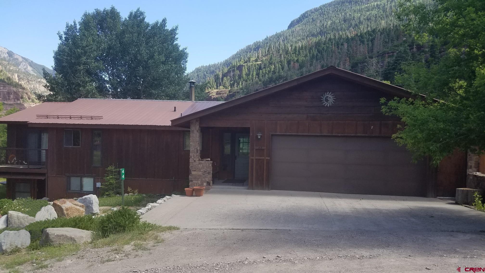 Large well maintained family home with small separate 1 bedroom 1 bath apartment with convenient patio. Ideal family home has 3 bedrooms with 2 full bath open living area, office, dining area and flex room. Attached 2 car garage, a large backyard complete with aspen/cottonwood trees yard is fully fenced. Bedrooms each have access out onto the south facing open deck area as well. Front area is zeroscaped. Views of Mt. Abrams and Corbett Peak. Minutes to hot springs, river walk and town.